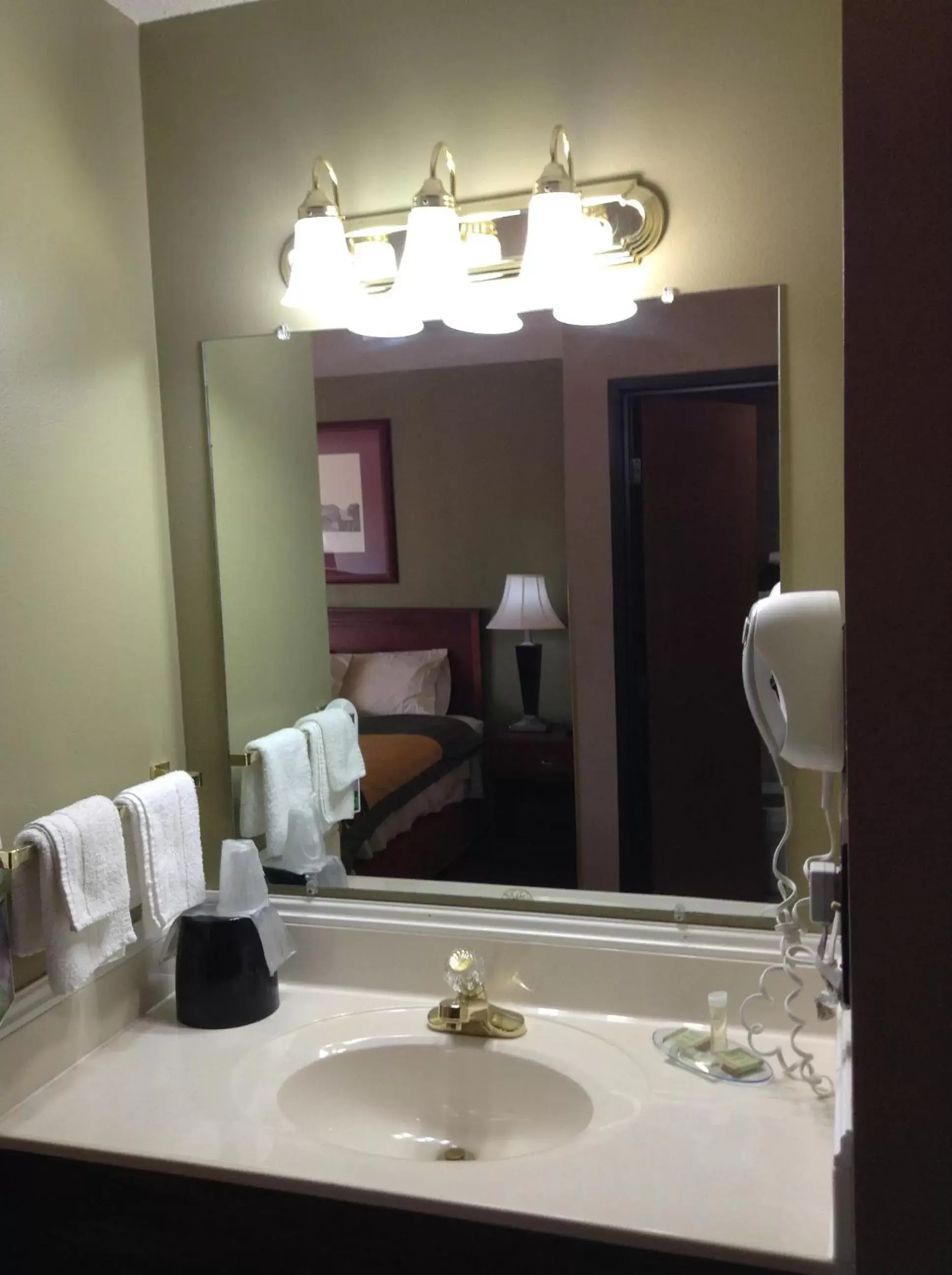 Bathroom in Heartland Hotel & Suites