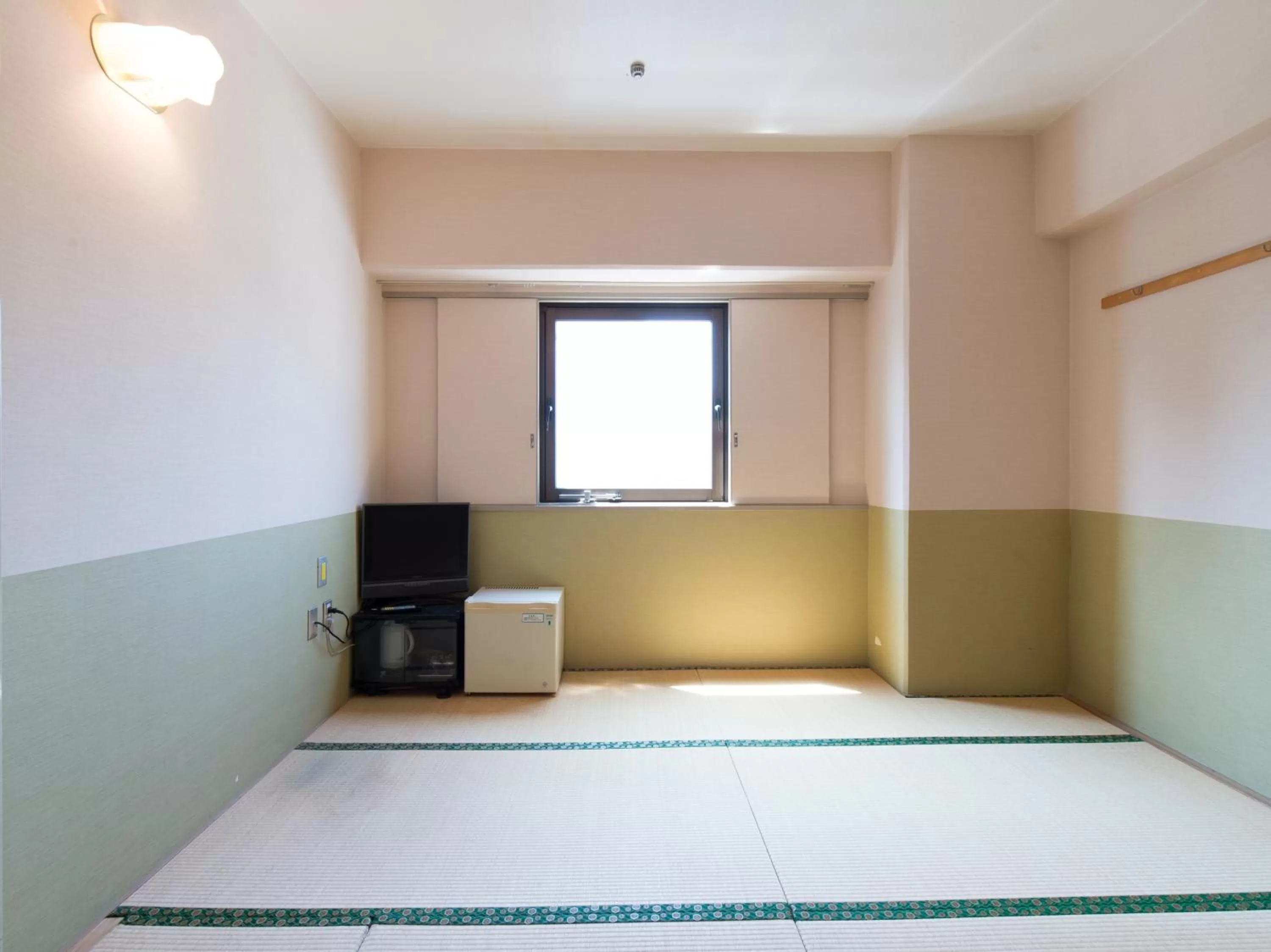 Photo of the whole room, Bed in Tabist Hotel Tetora Kitakyushu