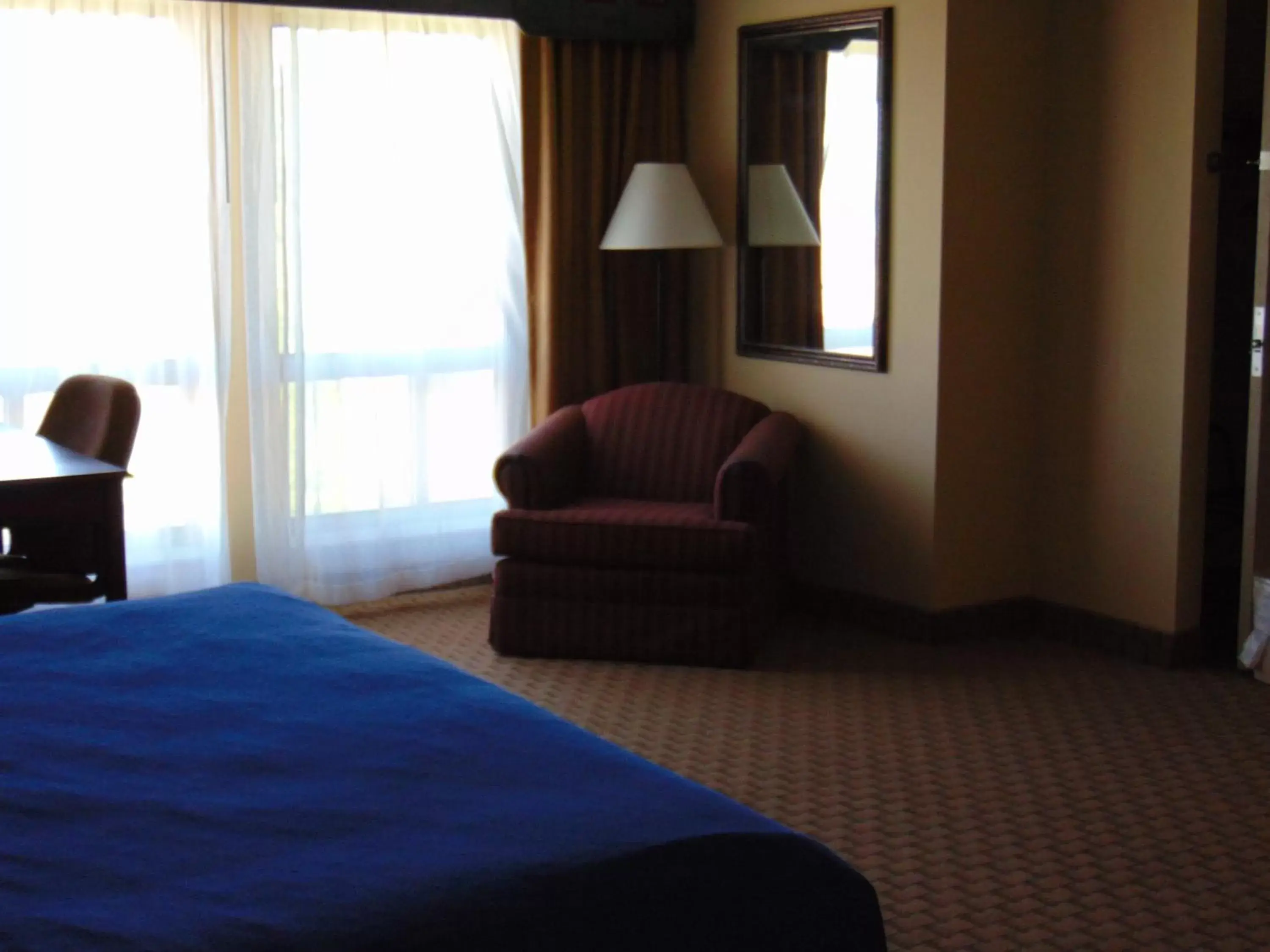 Seating area, Bed in Horse Creek Inn Seating area, Bed in Horse Creek Inn