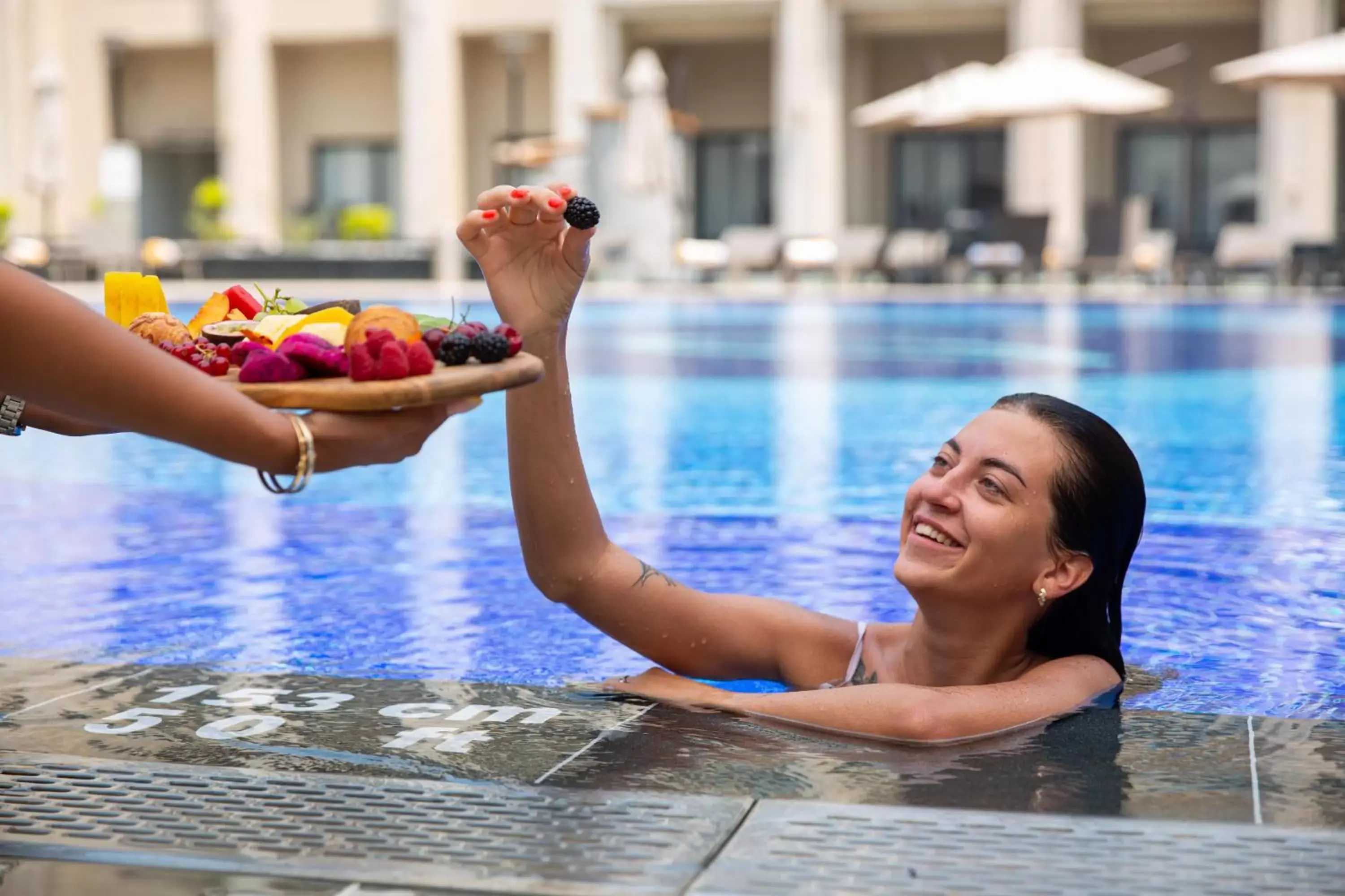 People, Swimming Pool in Triumph Luxury Hotel