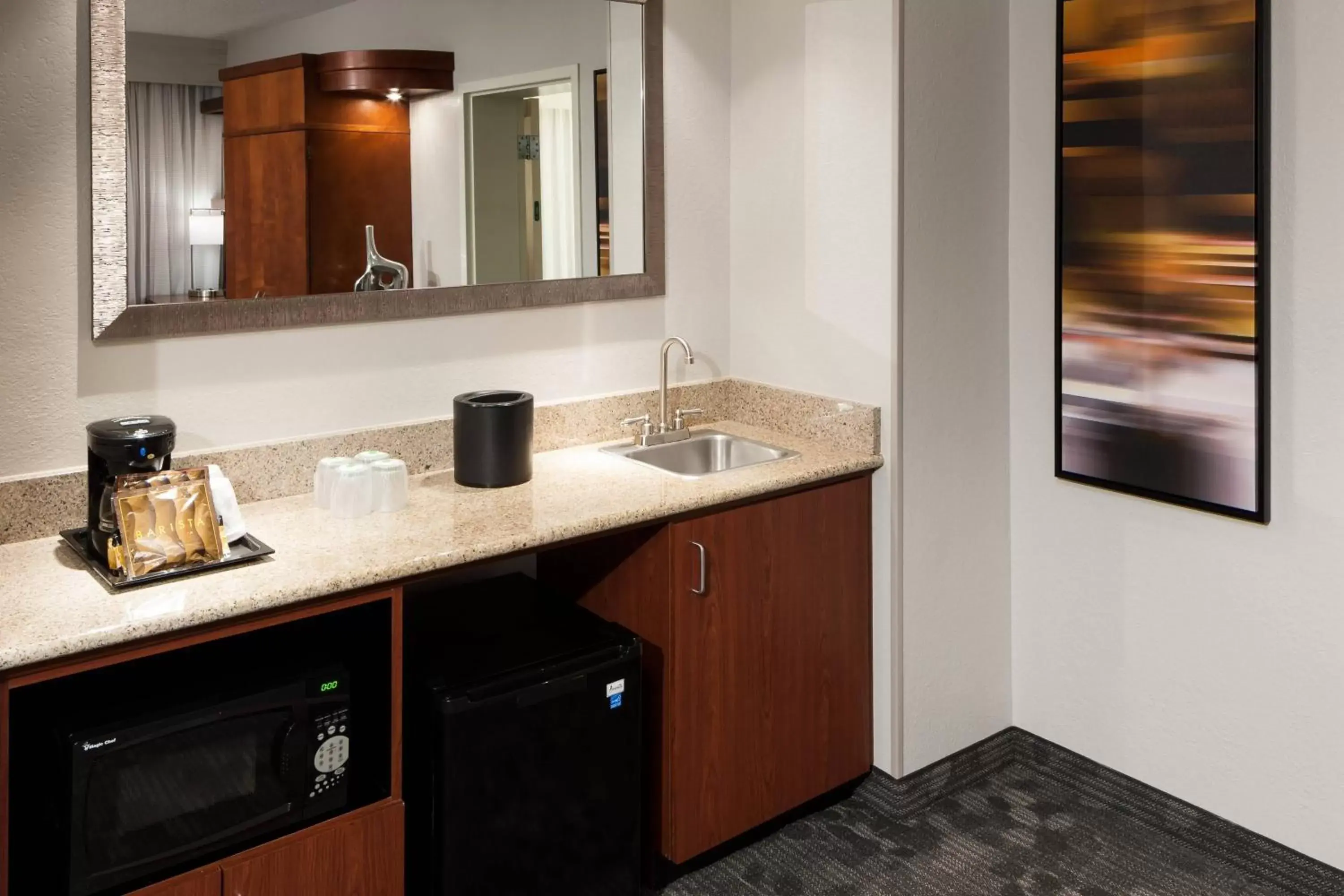 Photo of the whole room, Kitchen/Kitchenette in Courtyard by Marriott Miami at Dolphin Mall