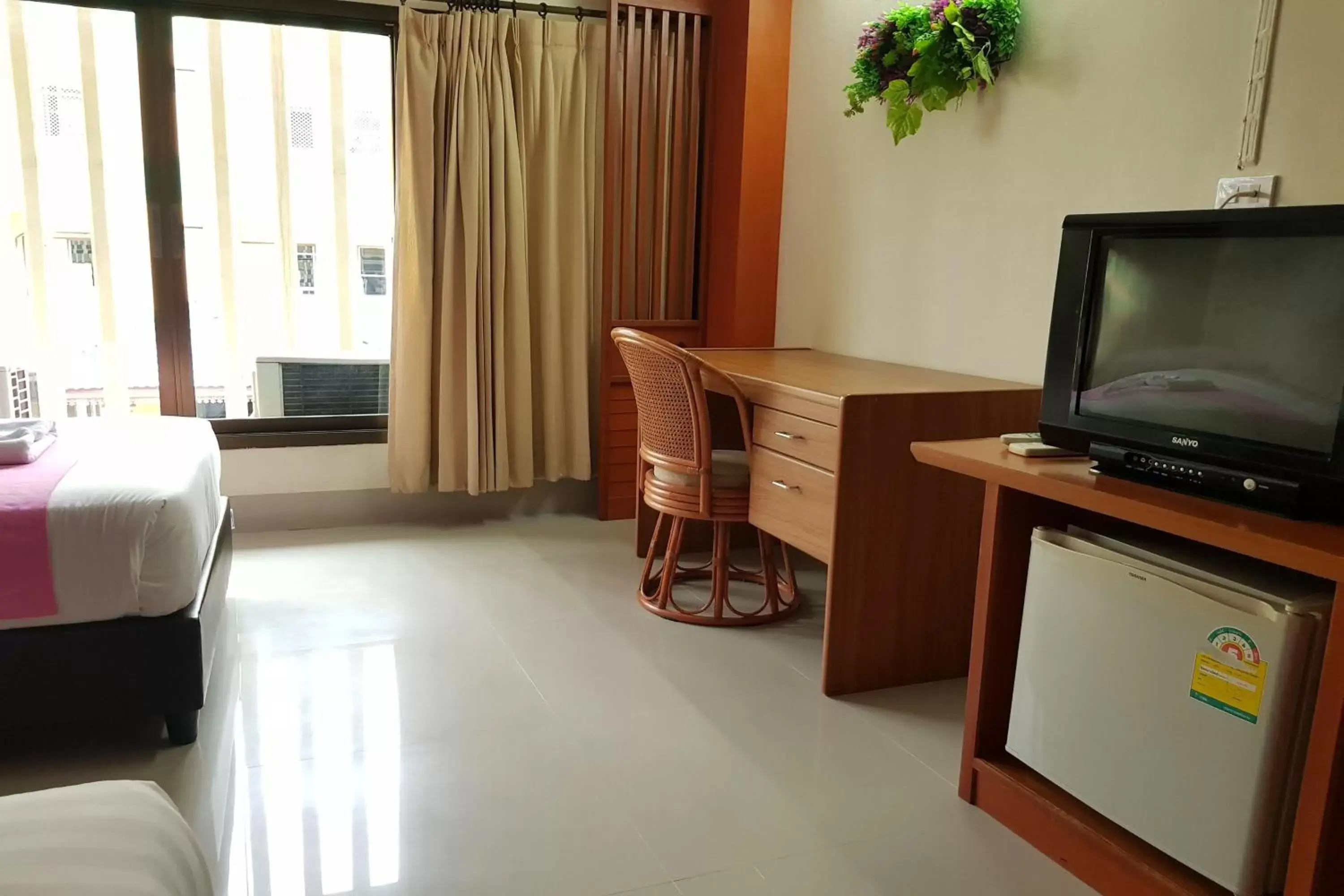 TV and multimedia, TV/Entertainment Center in Poonsook Phitsanulok Hotel SHA Plus