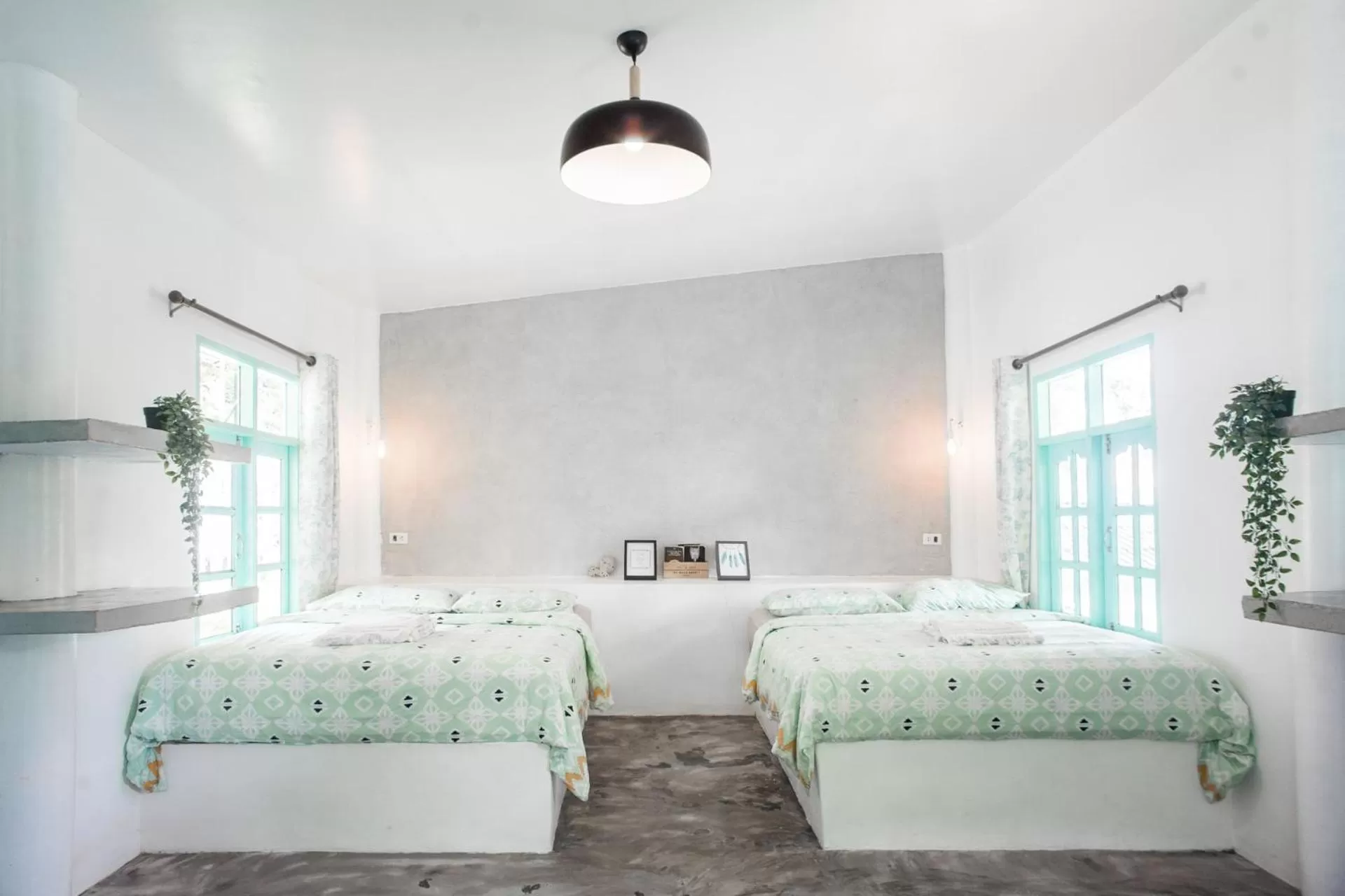 Bed in Indie Beach Bungalows