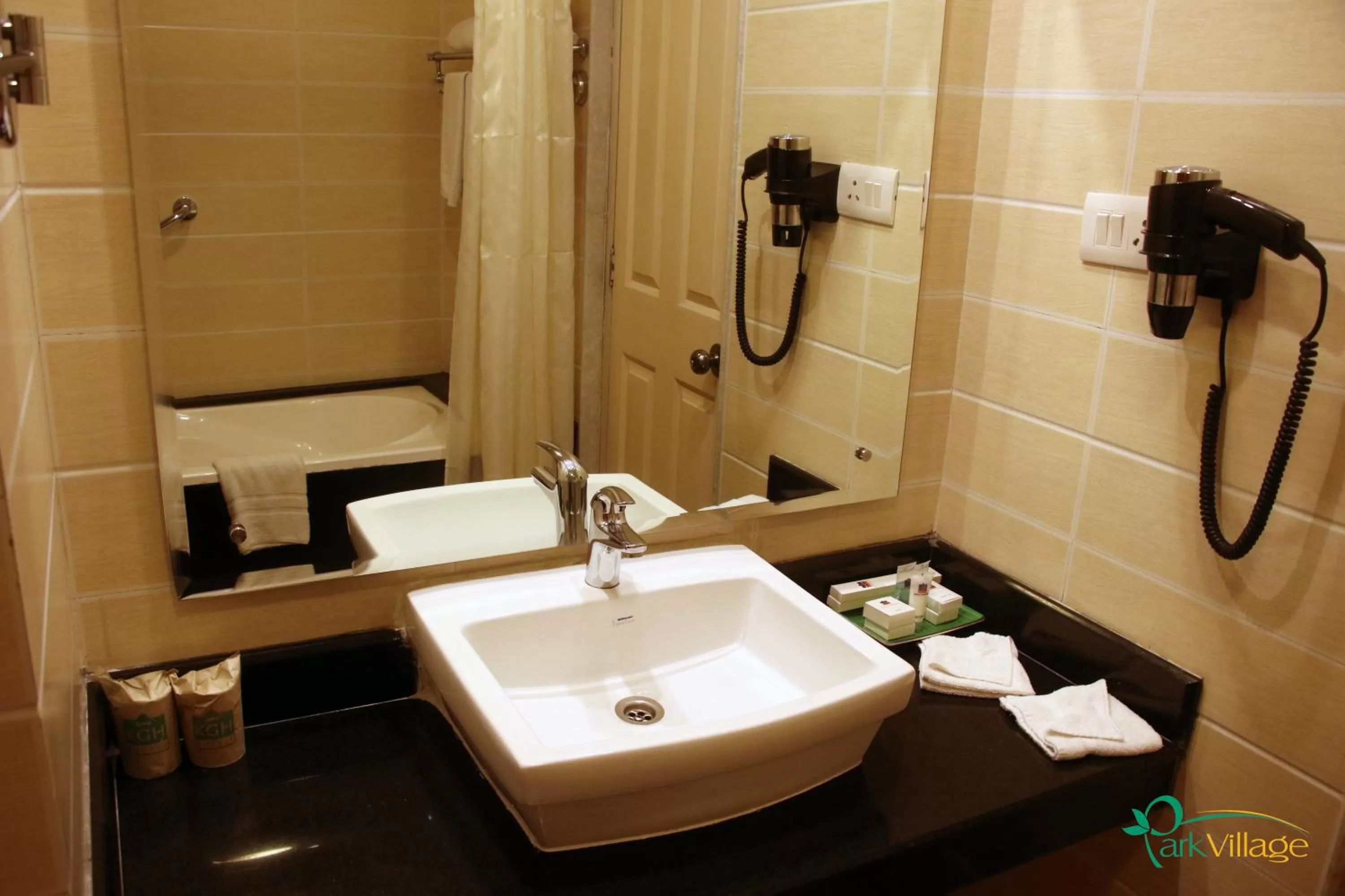 Bathroom in Park Village Resort by KGH Group