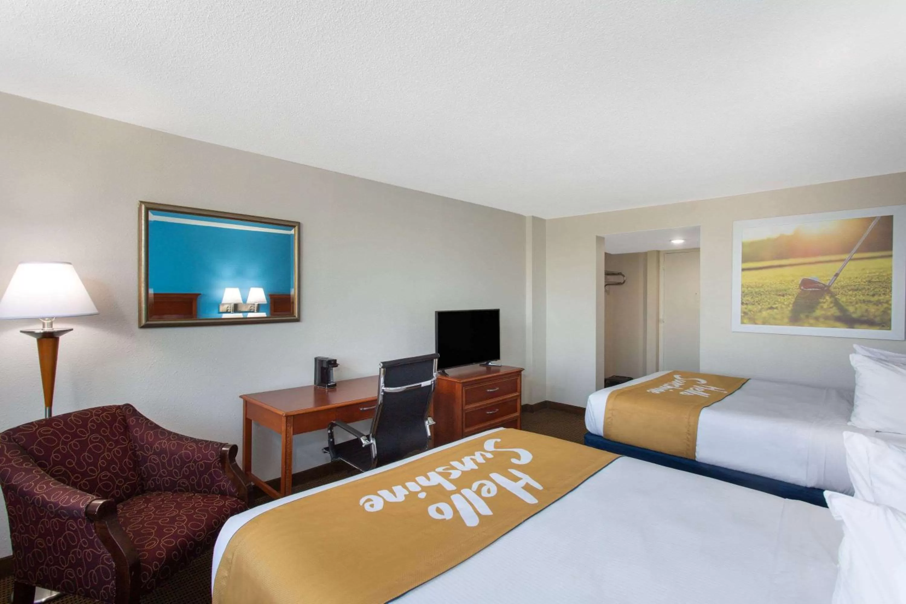 Photo of the whole room, Bed in Days Inn & Suites by Wyndham Tallahassee Conf Center I-10