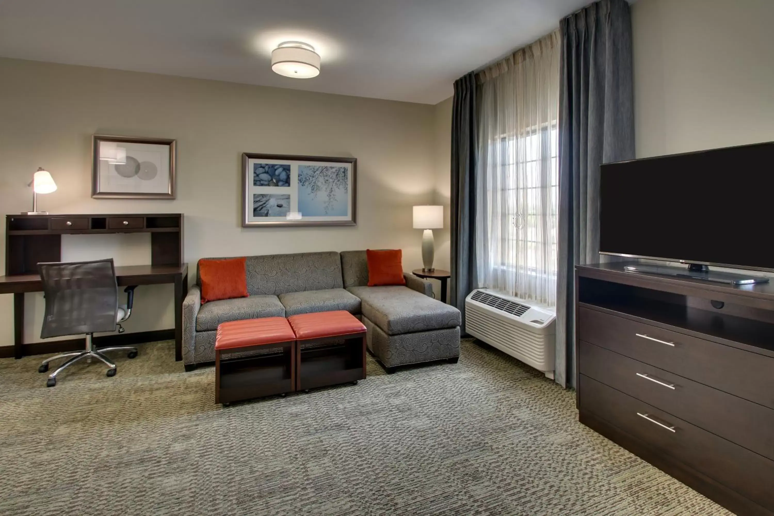 Living room, Seating Area in Staybridge Suites - Rock Hill, an IHG Hotel
