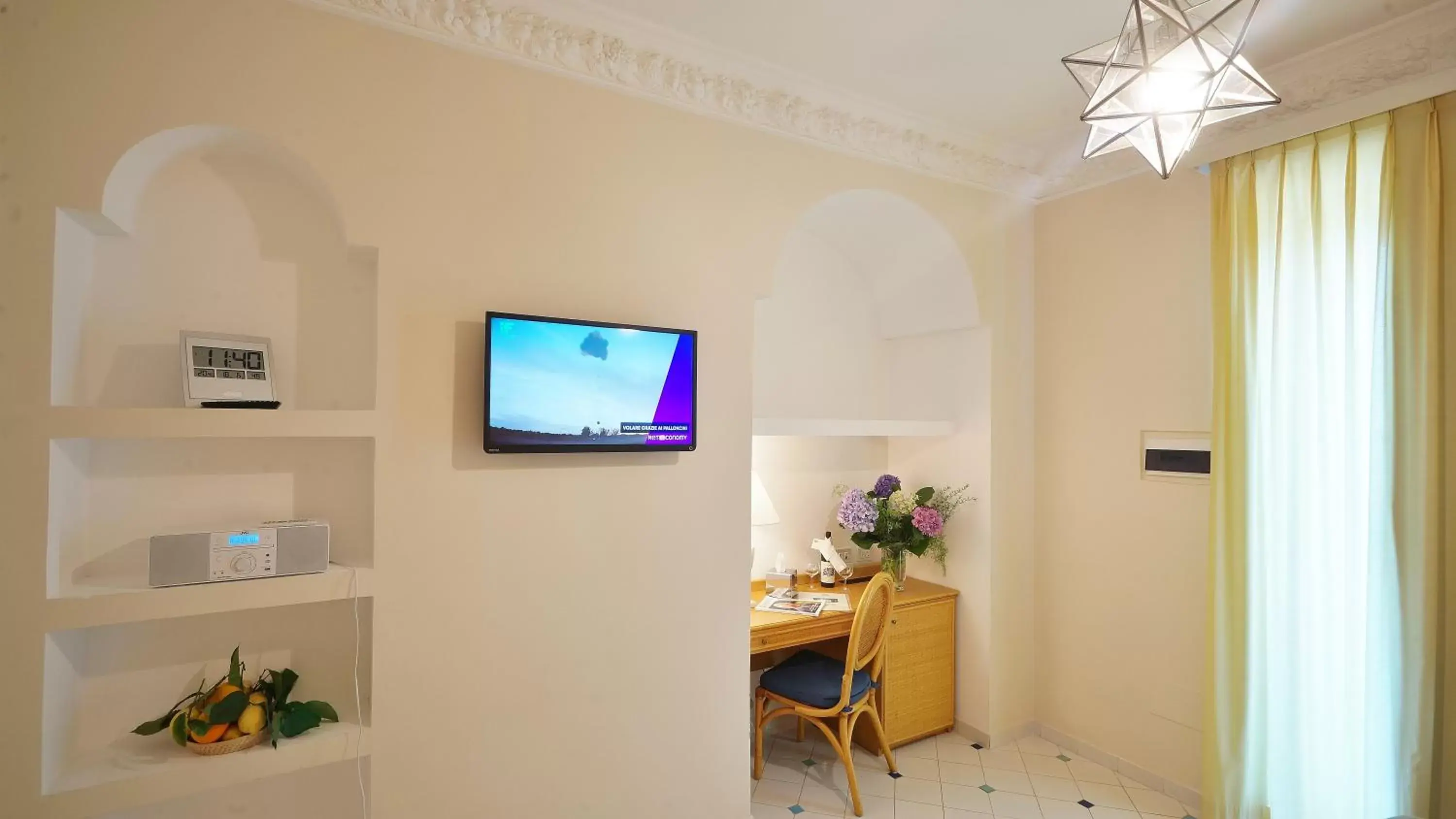 TV and multimedia, TV/Entertainment Center in Grand Hotel Aminta