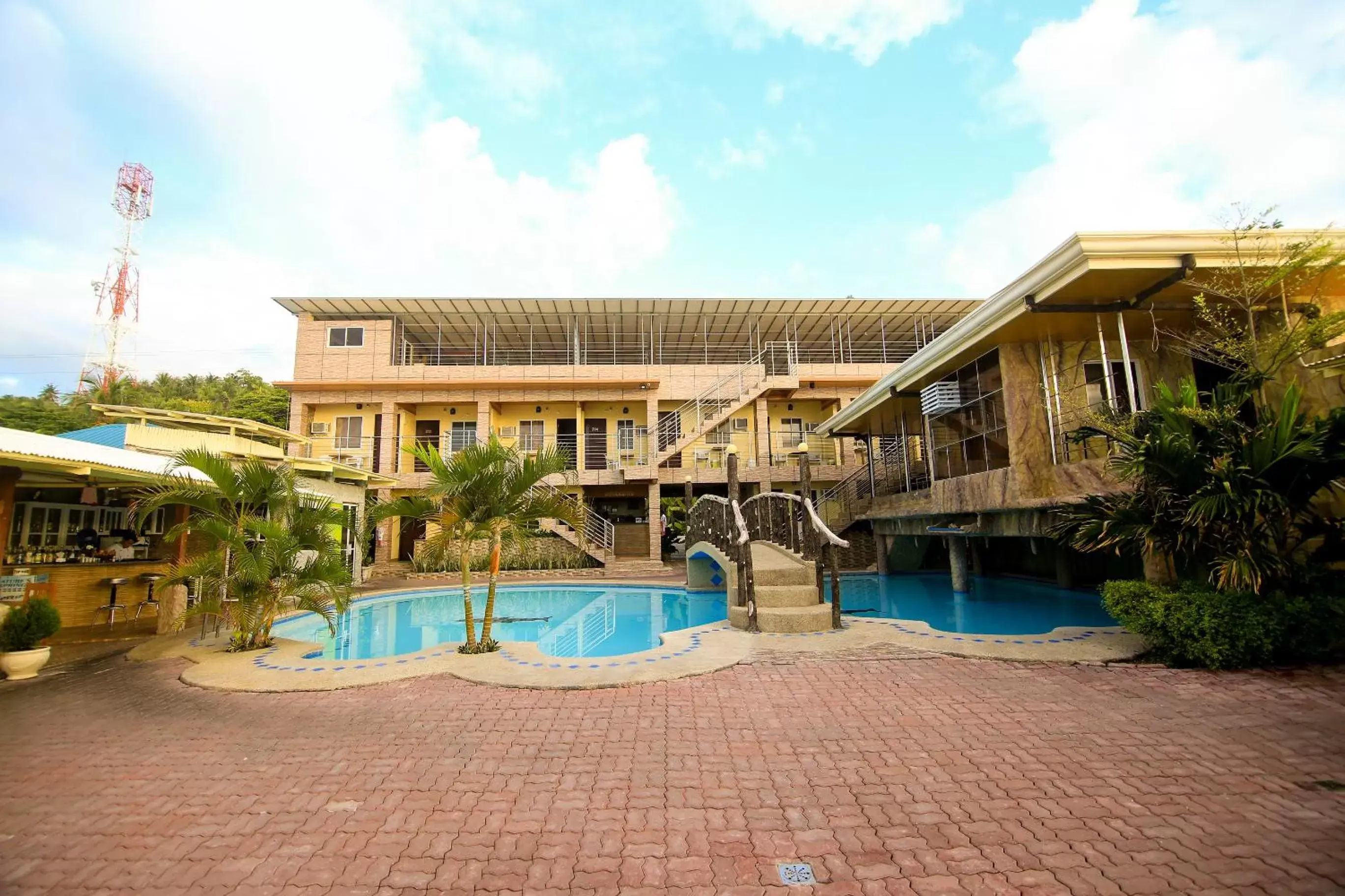 Property building, Swimming Pool in GingGing Hotel And Resort