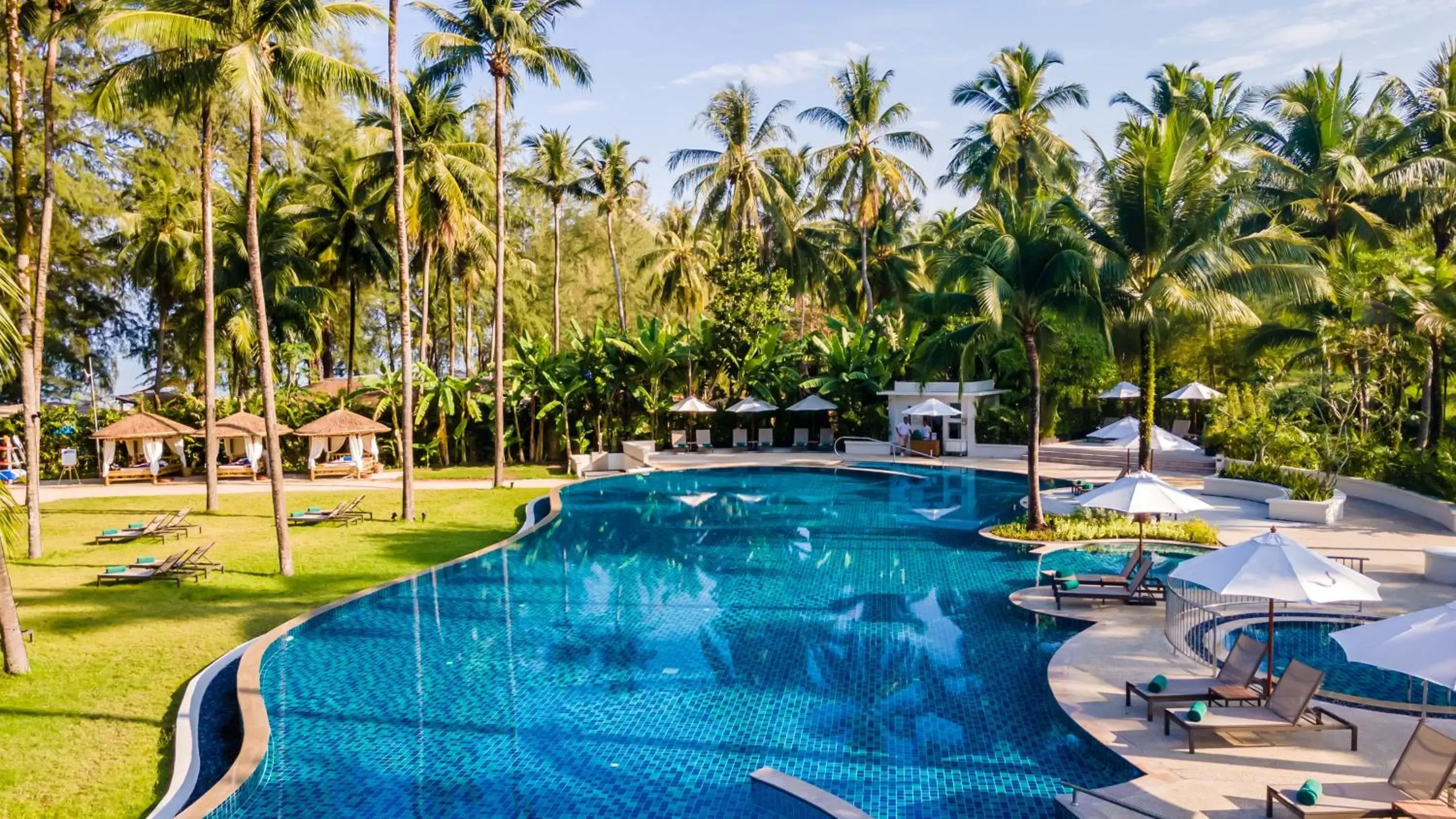 Swimming Pool in Outrigger Khao Lak Beach Resort - SHA Extra Plus