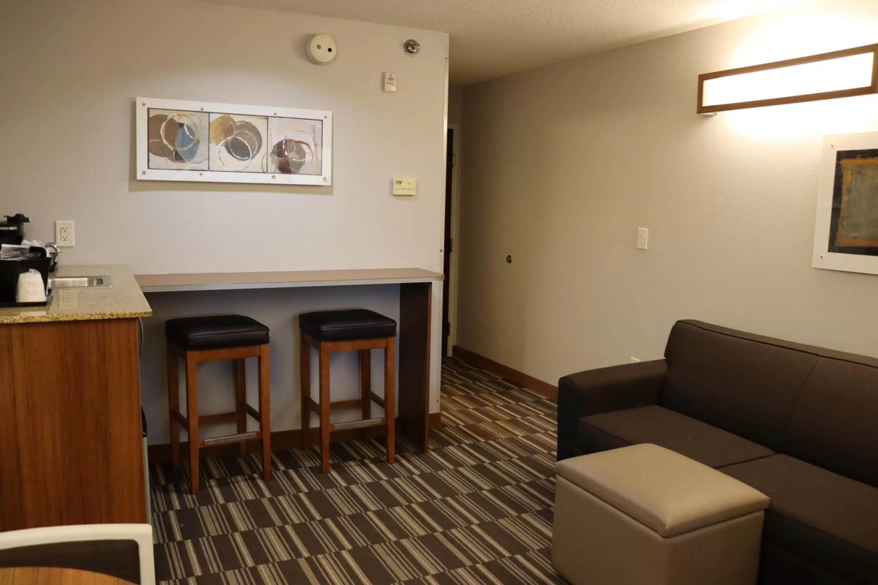 Living room in Microtel Inn & Suites by Wyndham Columbus Near Fort Moore