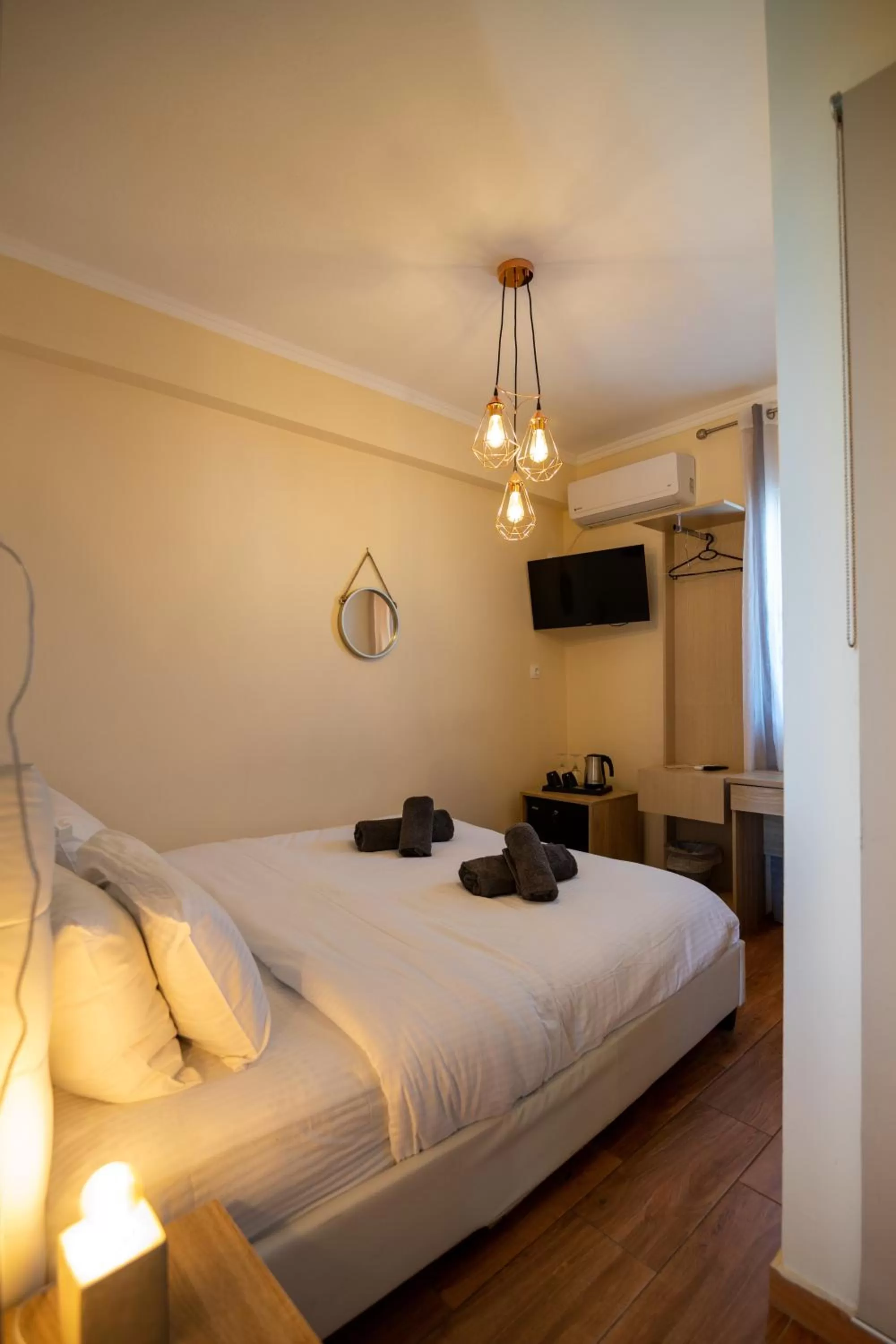 Bed in Votsalakia Hotel & Luxury Apartments