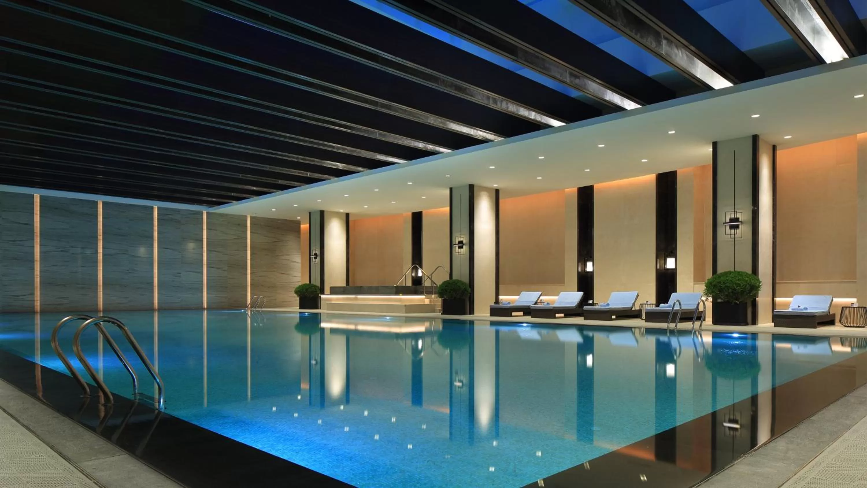 Swimming pool in InterContinental Shanghai Hongqiao NECC by IHG