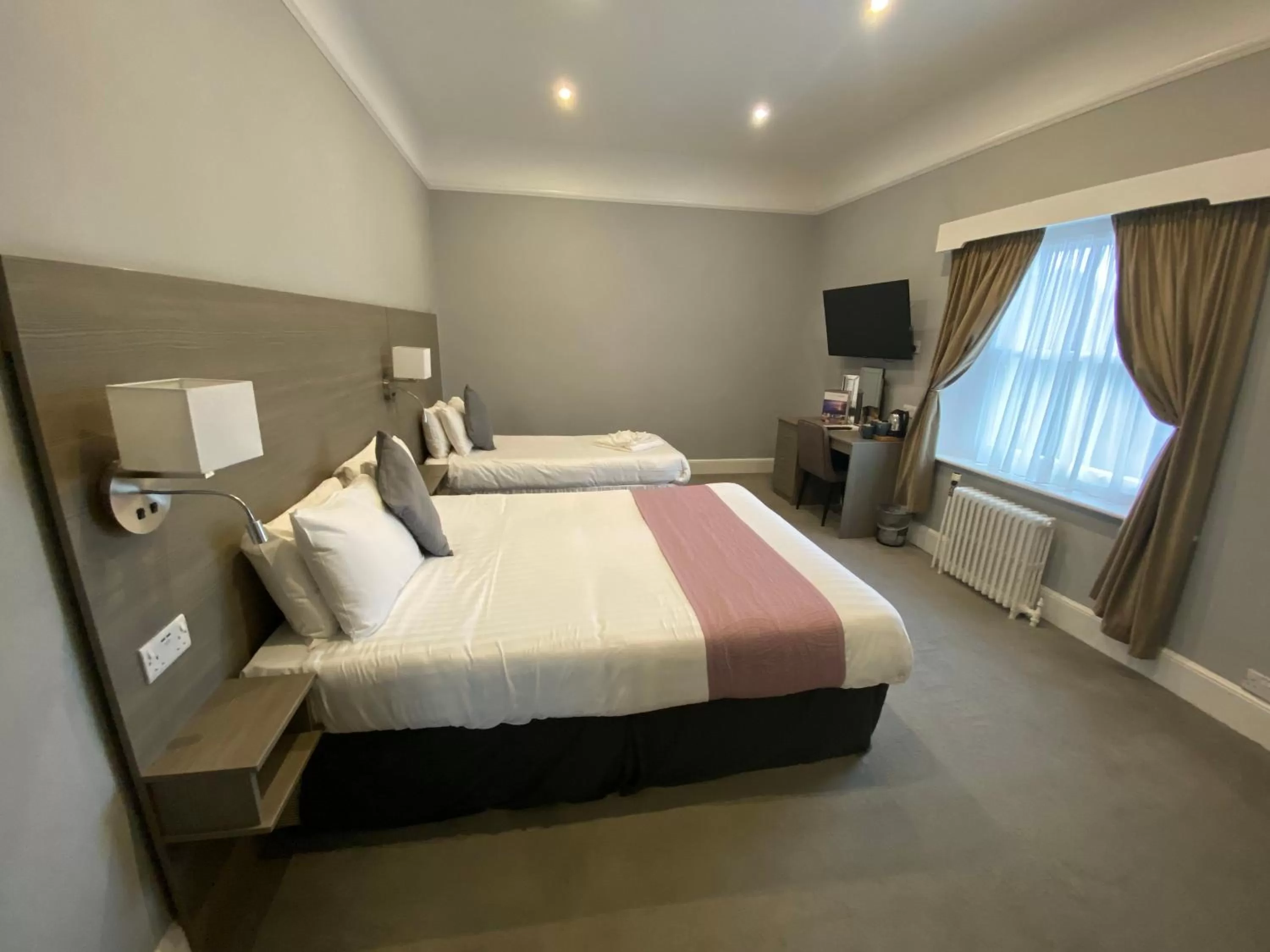 Photo of the whole room, Bed in Cottonwood Boutique