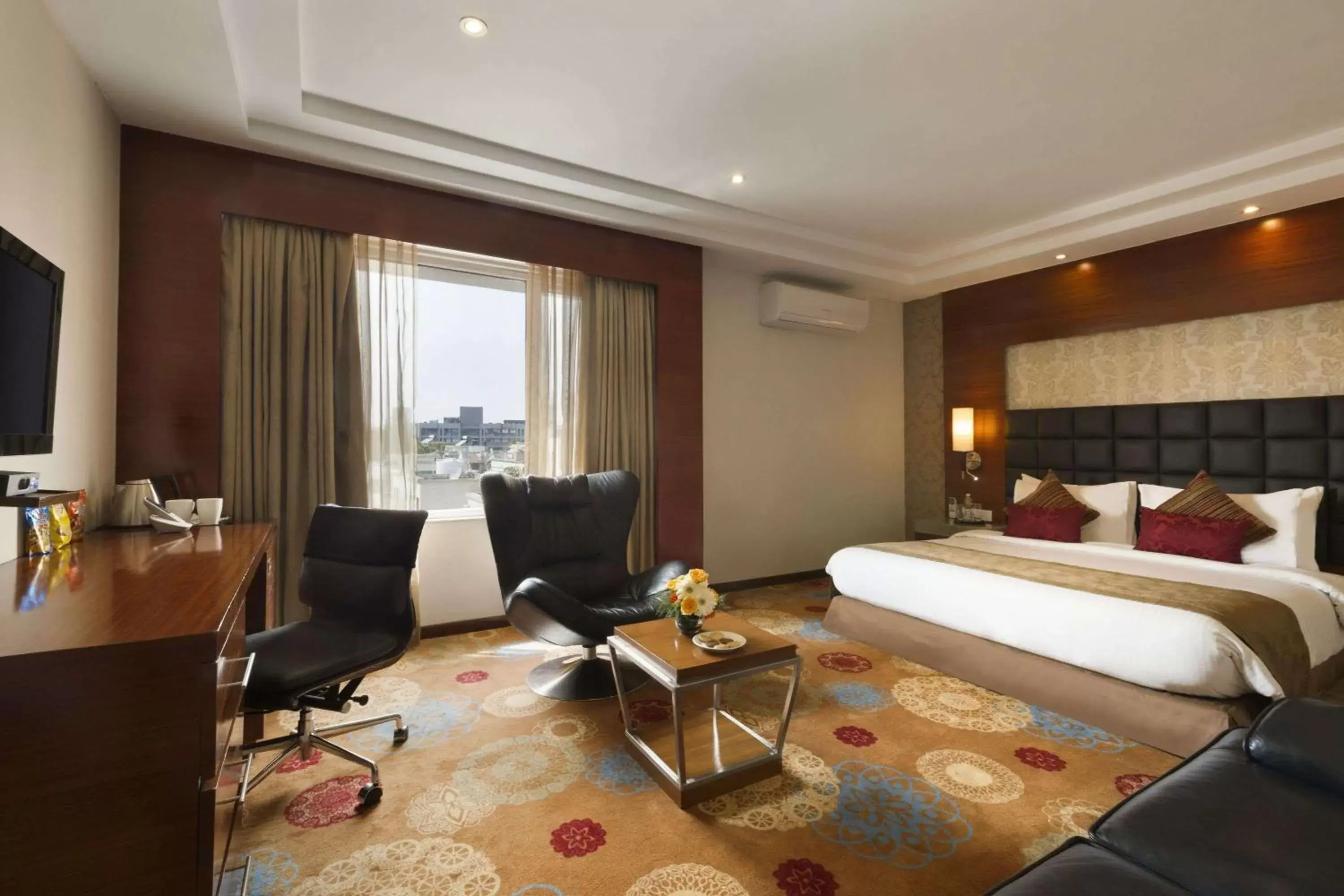 Photo of the whole room, Bed in Ramada Ahmedabad Photo of the whole room, Bed in Ramada Ahmedabad