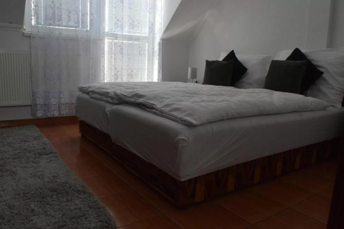 Bed in Aqua Oazis Apartman