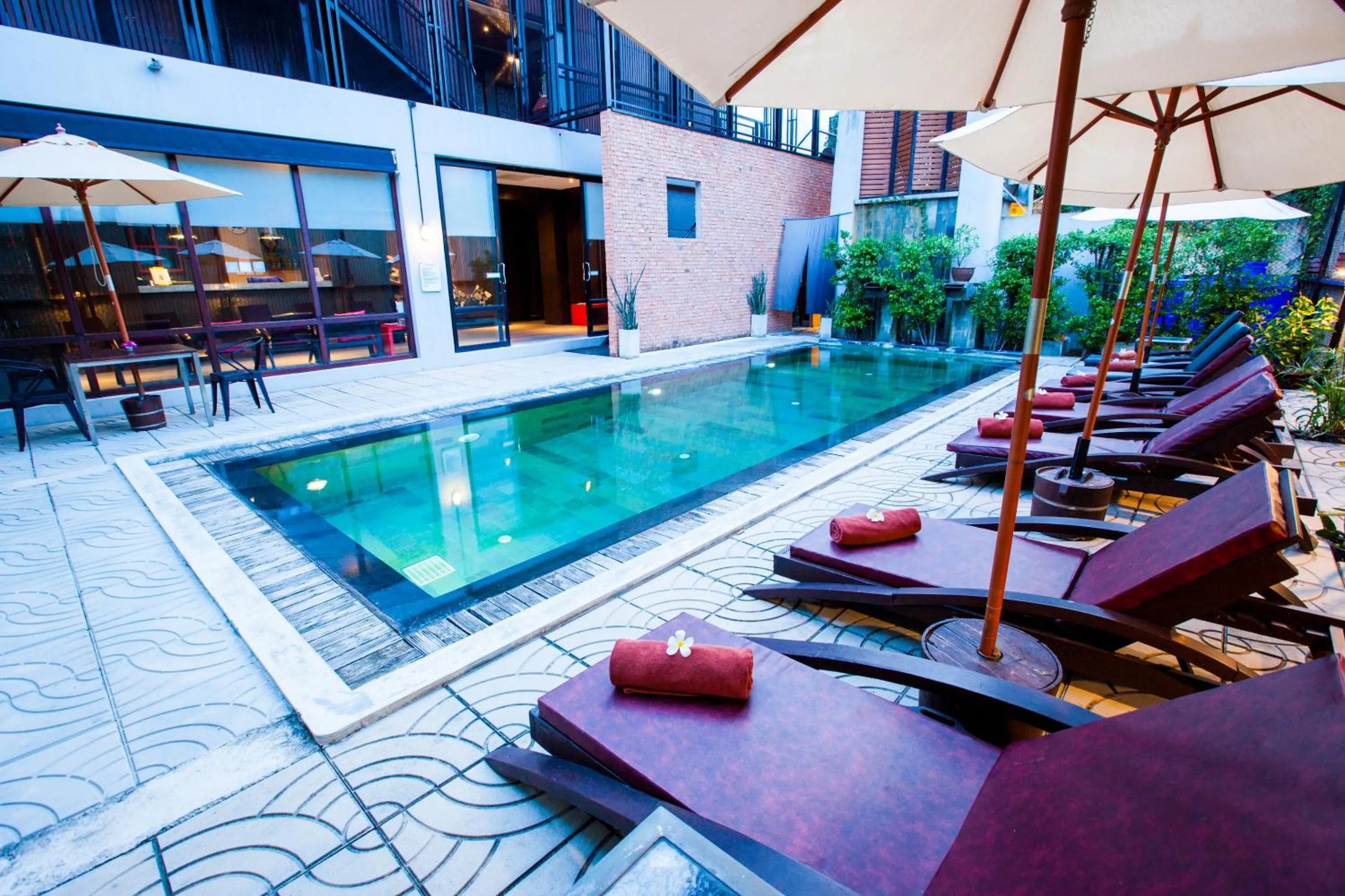 Swimming pool in Amenity Apartel Samui