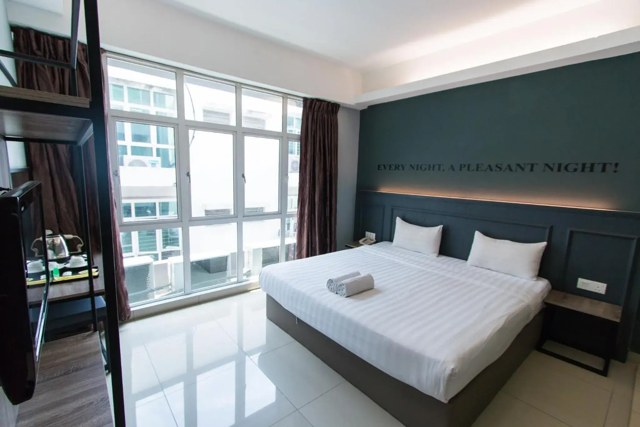 Photo of the whole room, Bed in Hotel 99 Bandar Puteri Puchong