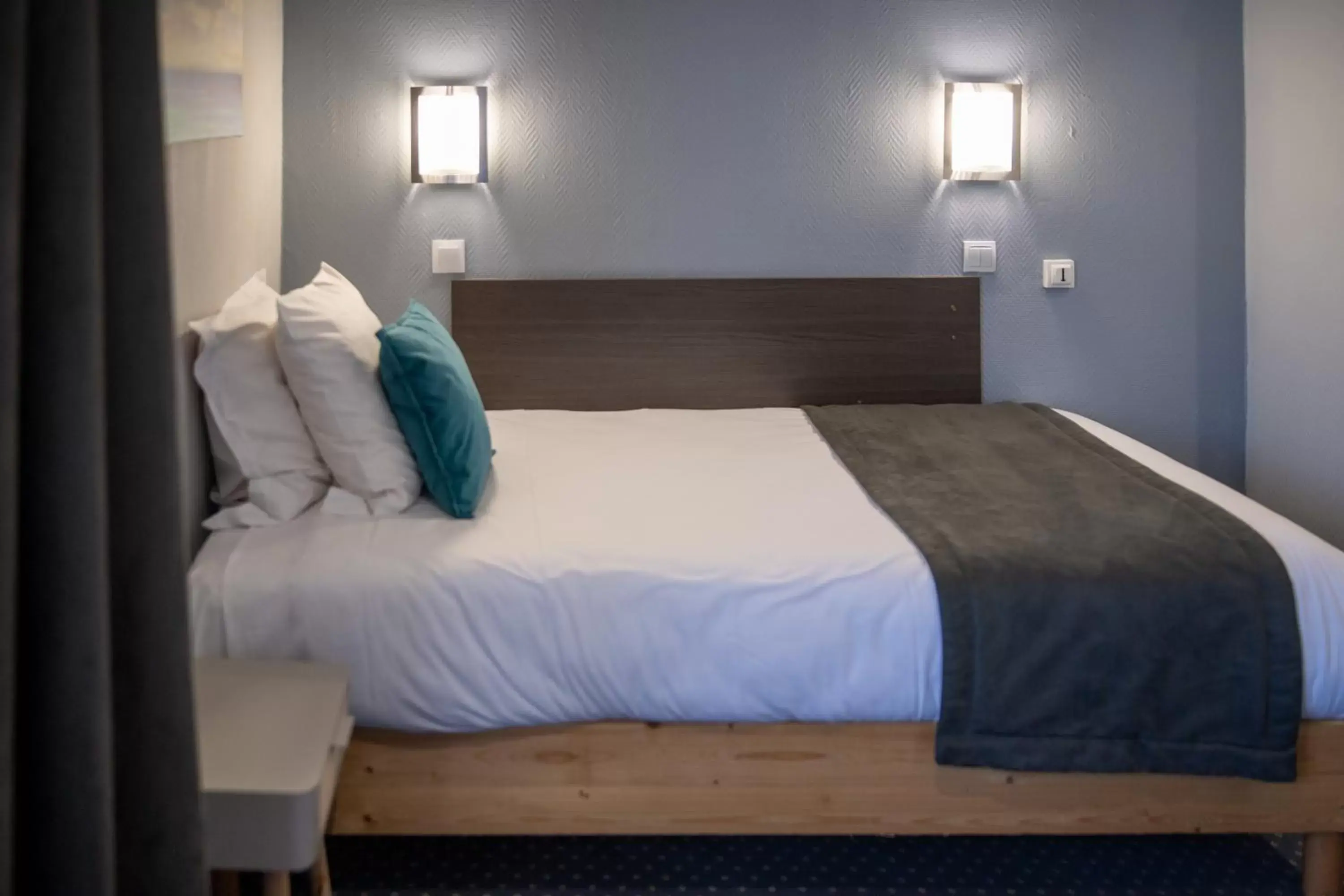 Bed in Hotel de Normandie