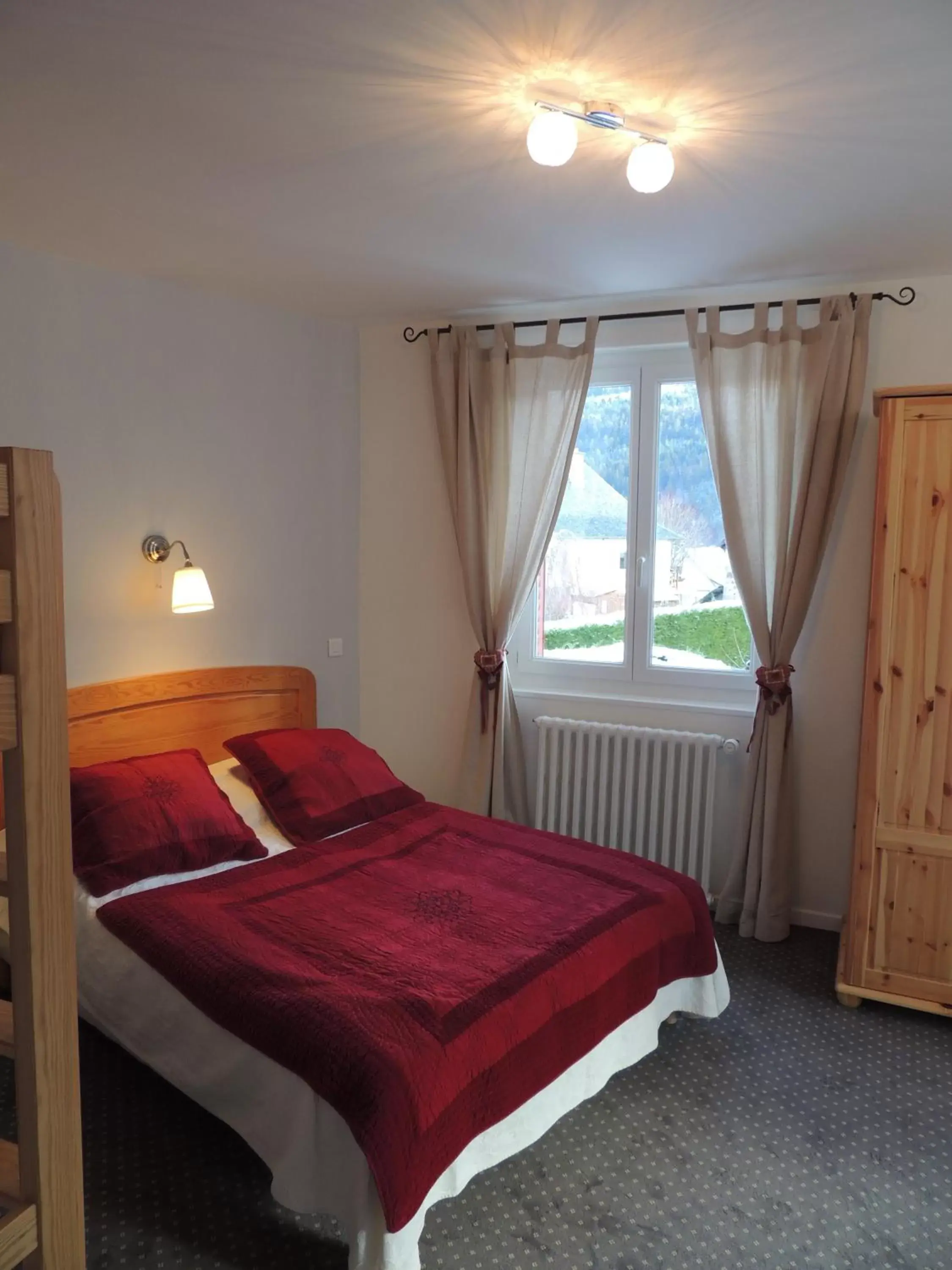 Photo of the whole room, Bed in Hôtel Restaurant du Plomb du Cantal