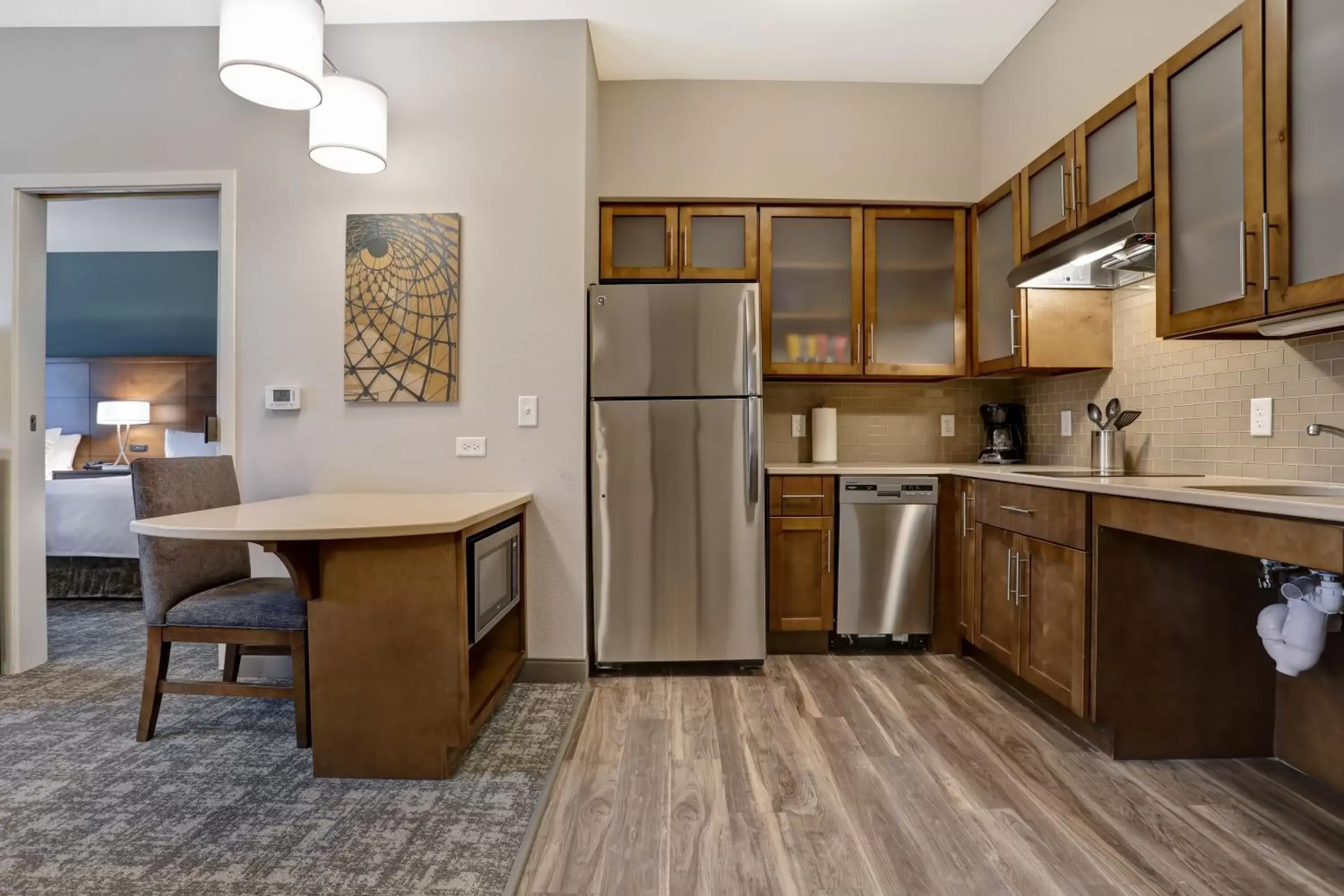 Photo of the whole room, Kitchen/Kitchenette in Staybridge Suites - Overland Park - Kansas City S, an IHG Hotel