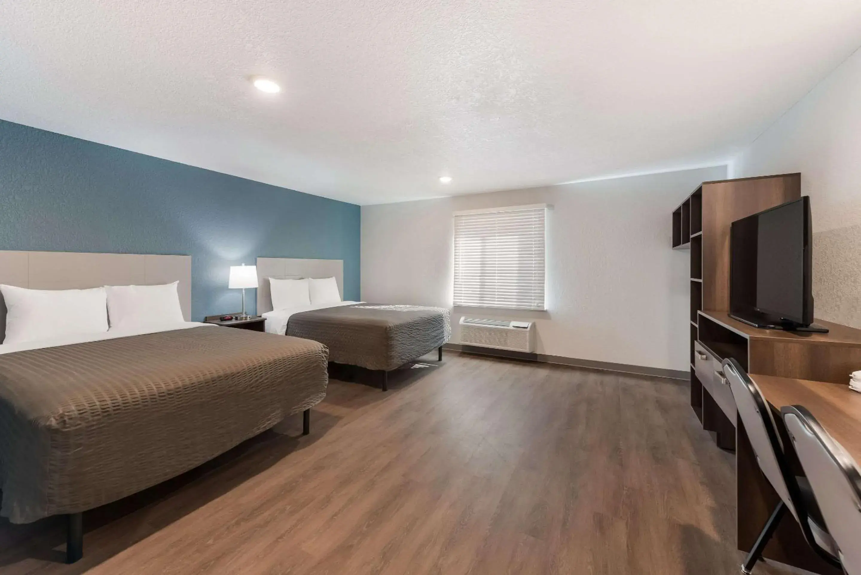 Bedroom, Bed in WoodSpring Suites Dayton North