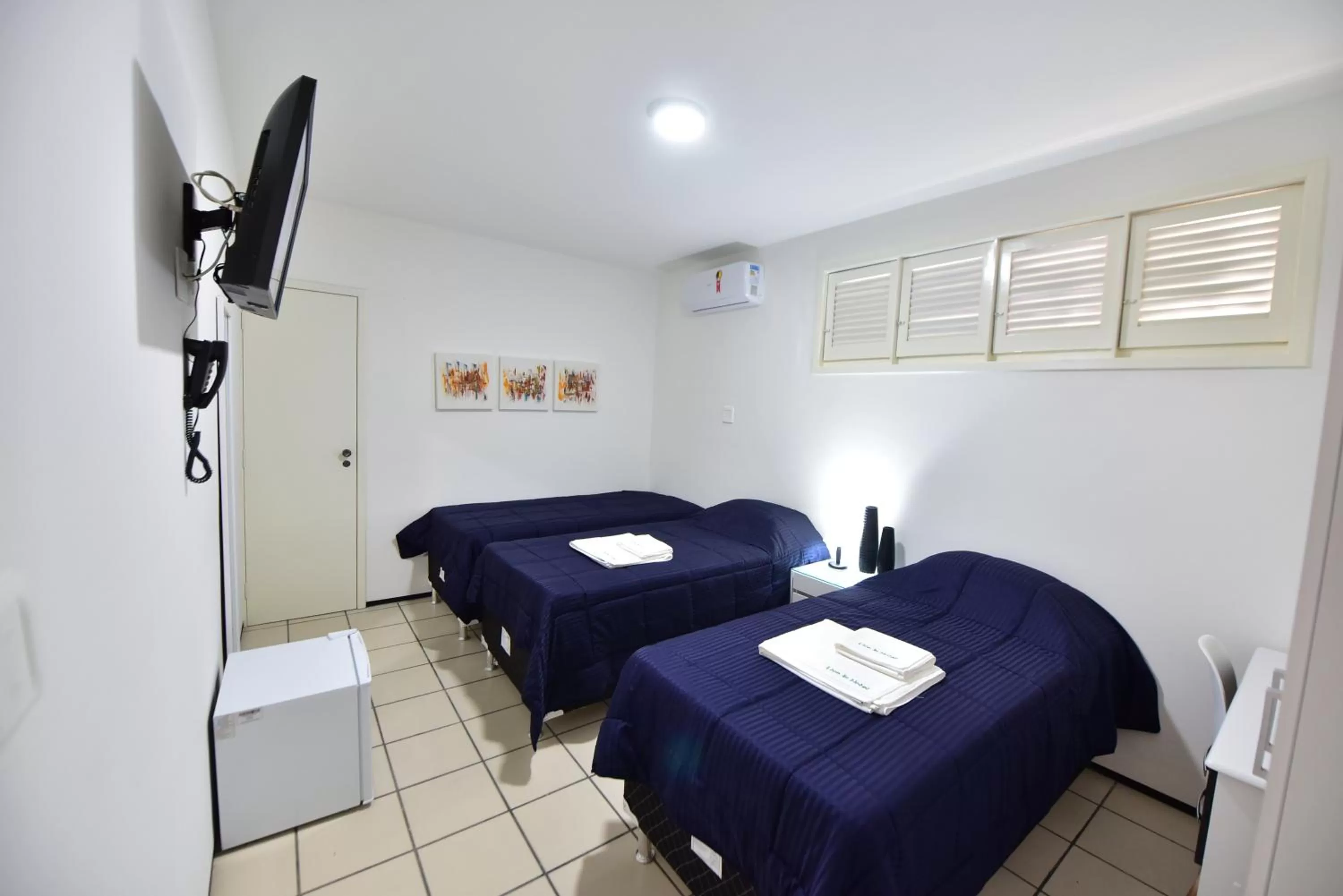 Bed in LIVE IN FORTALEZA HOTEL