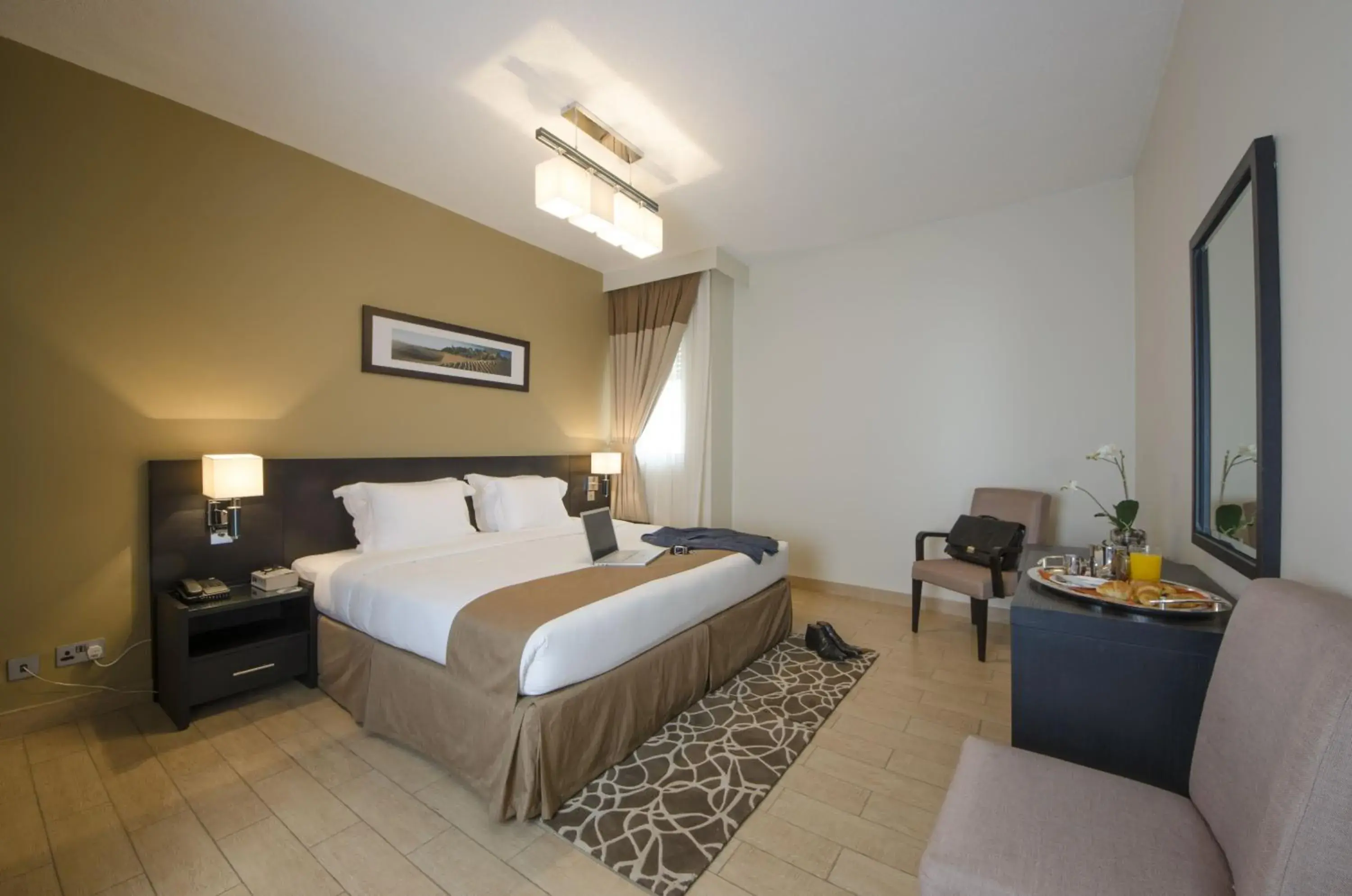 Photo of the whole room, Bed in The Apartments, Dubai World Trade Centre Hotel Apartments