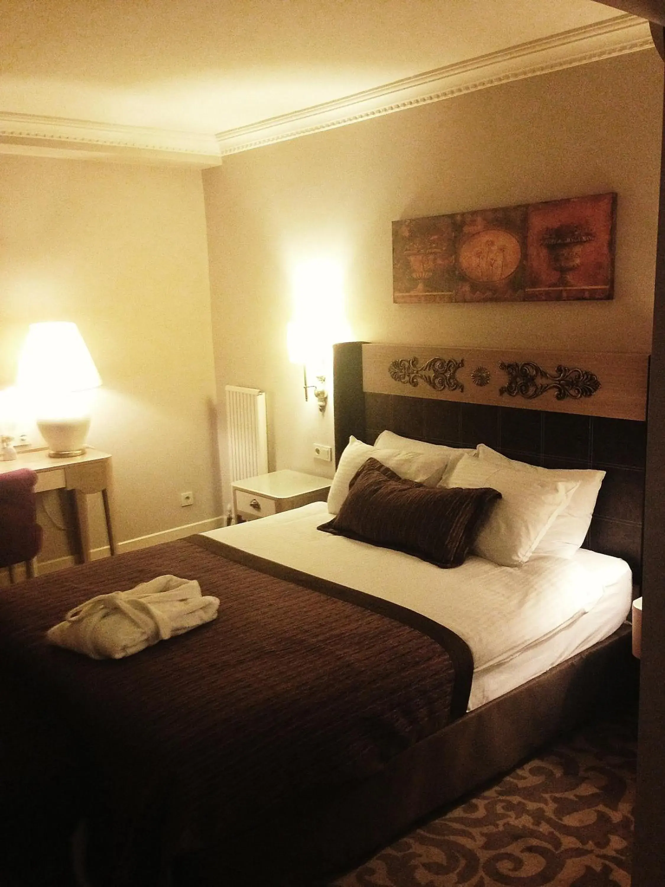 Bed in Sonno Boutique Rooms & Suites