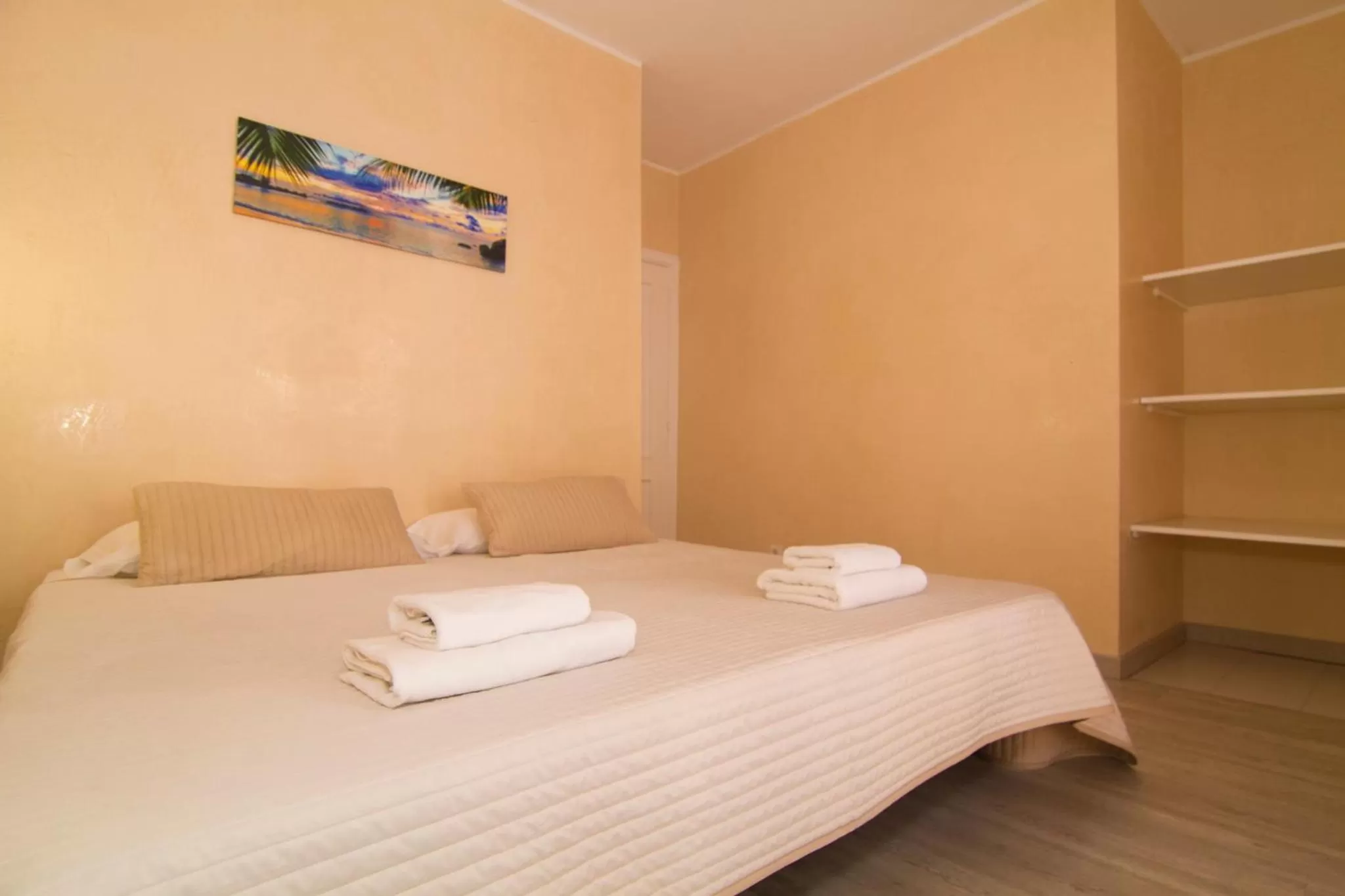 Bed in Yucca Park ApartHotel