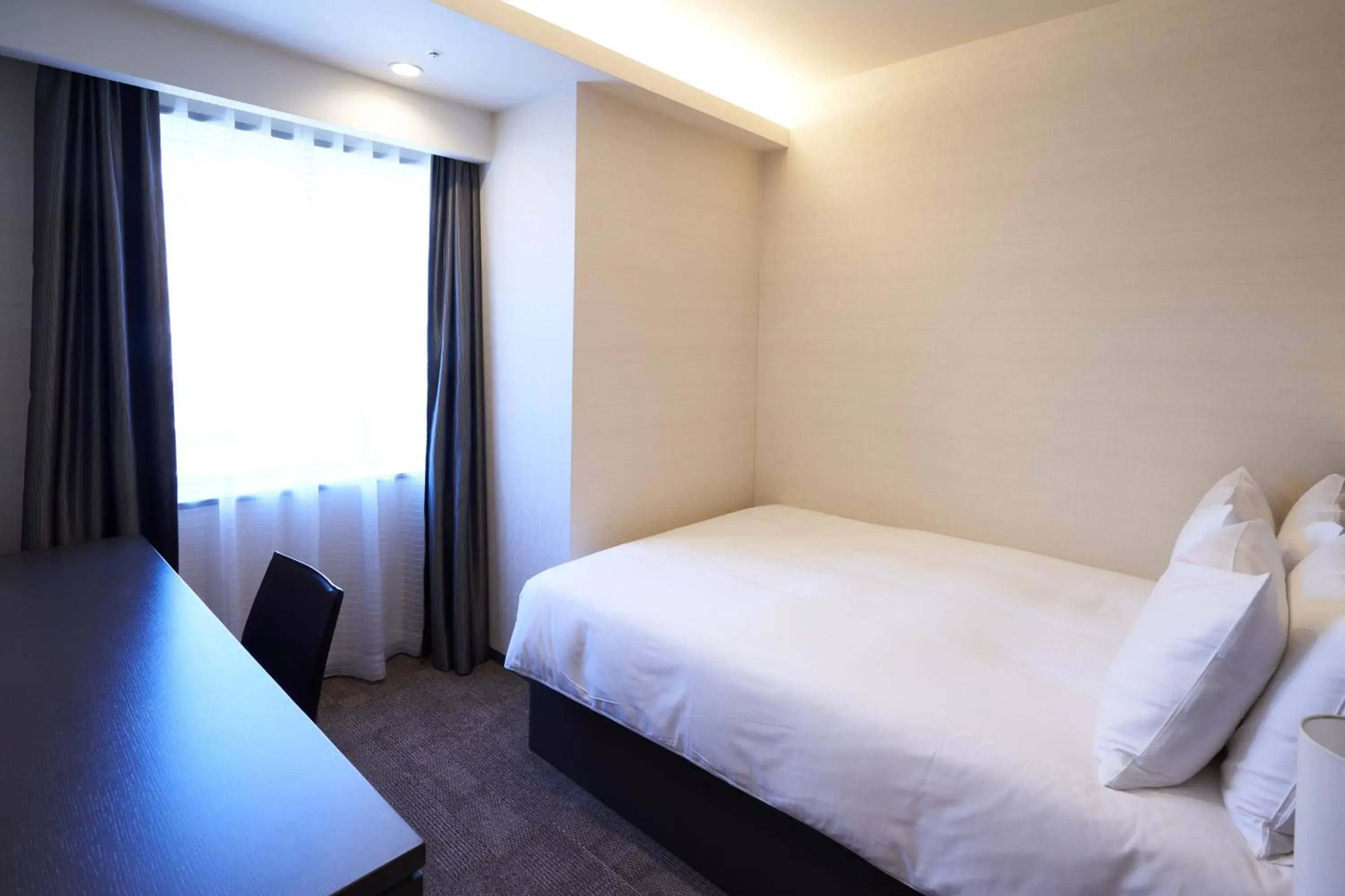 Bedroom, Bed in Holiday Inn & Suites Shin Osaka, an IHG Hotel