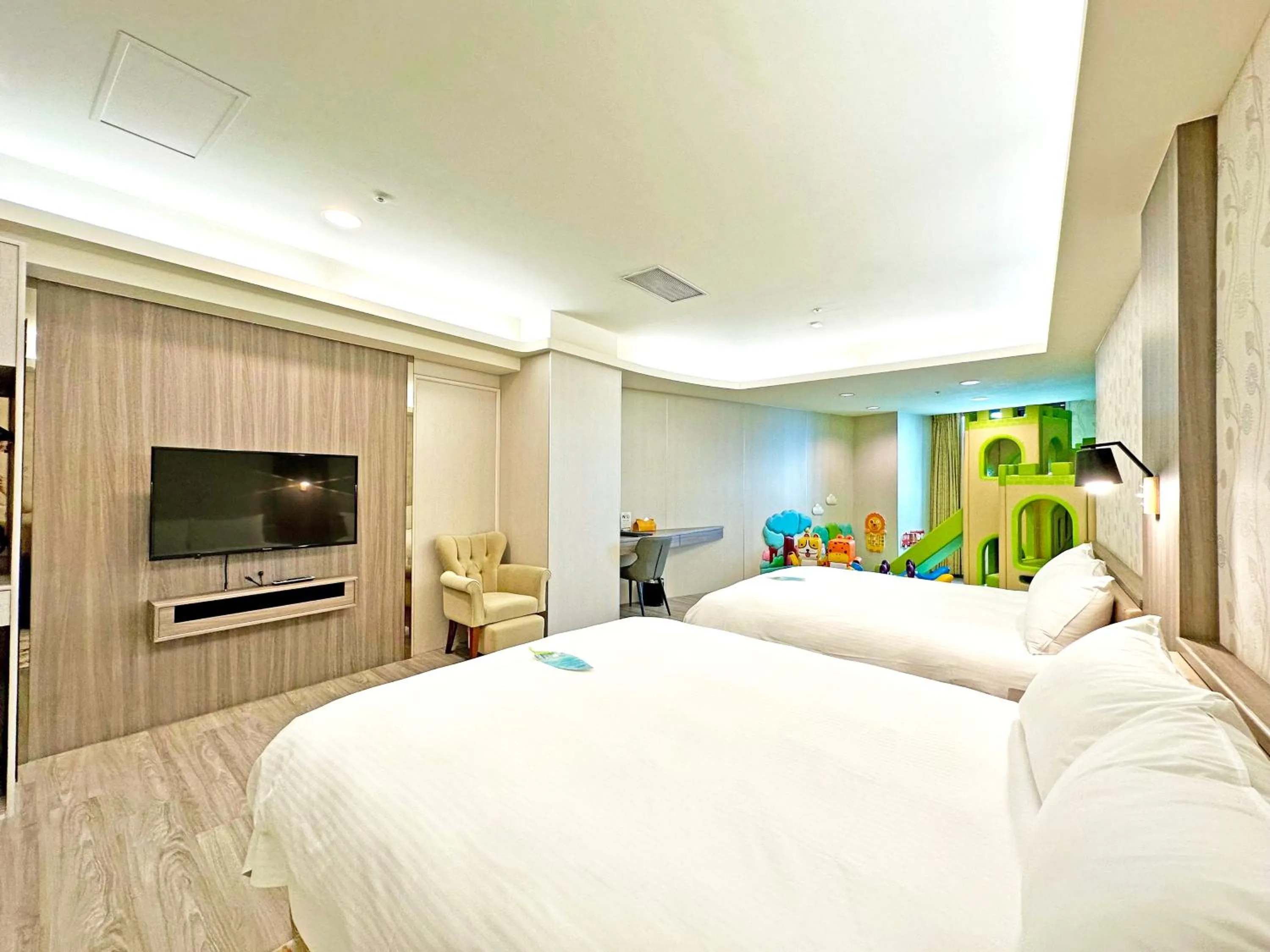 Bed in Grand Earl Hotel