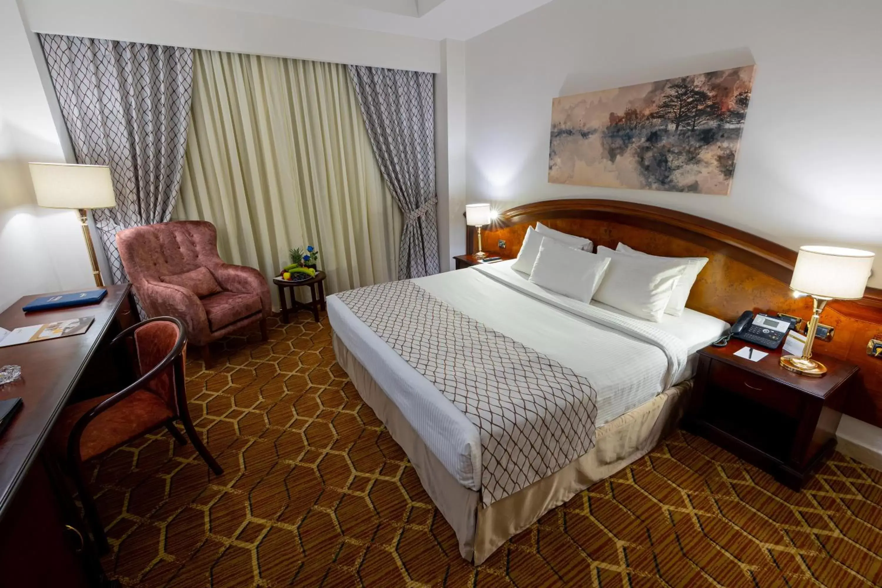 Photo of the whole room, Bed in Triumph Plaza Hotel