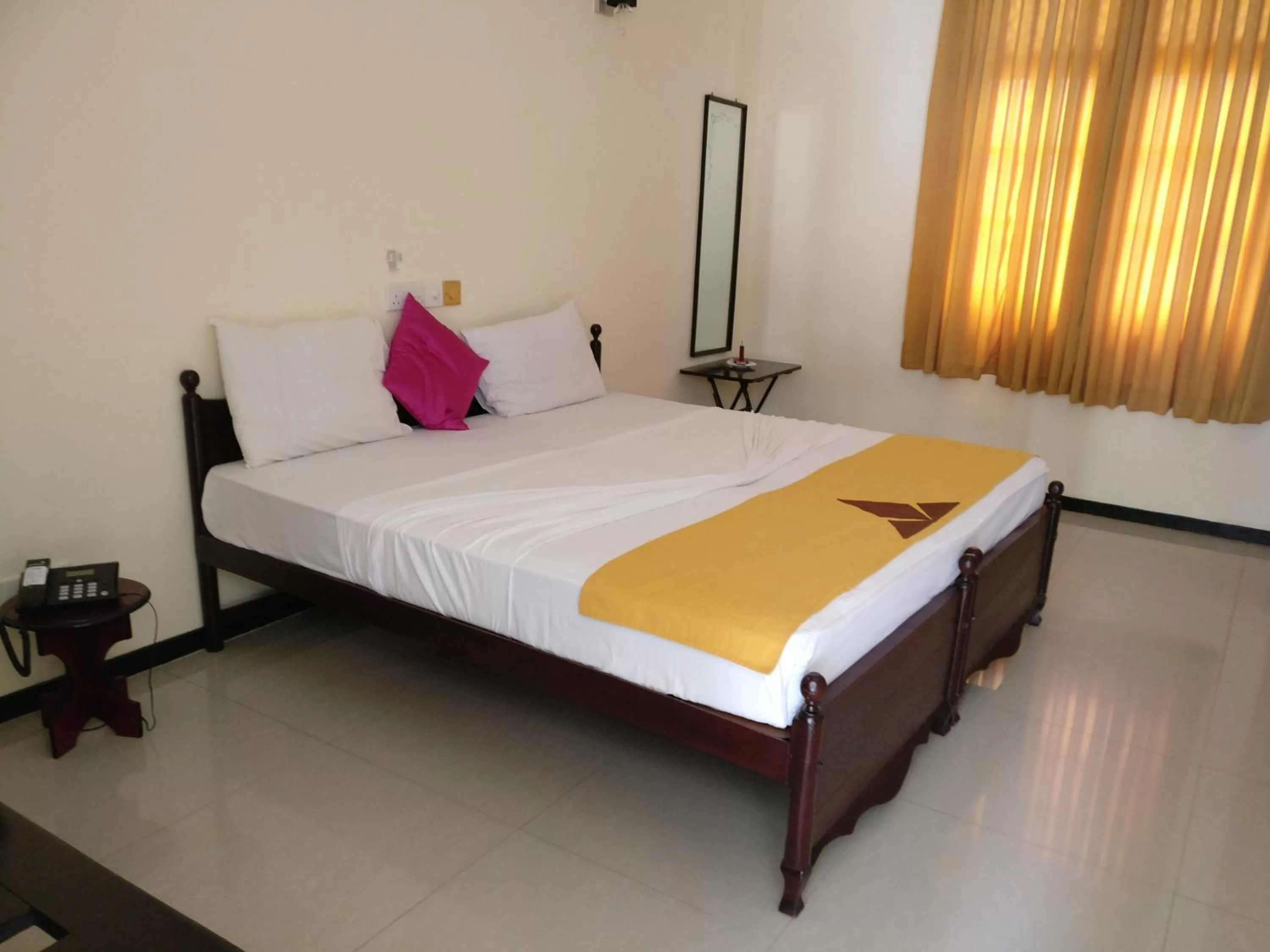 Photo of the whole room, Bed in Jayasinghe Holiday Resort