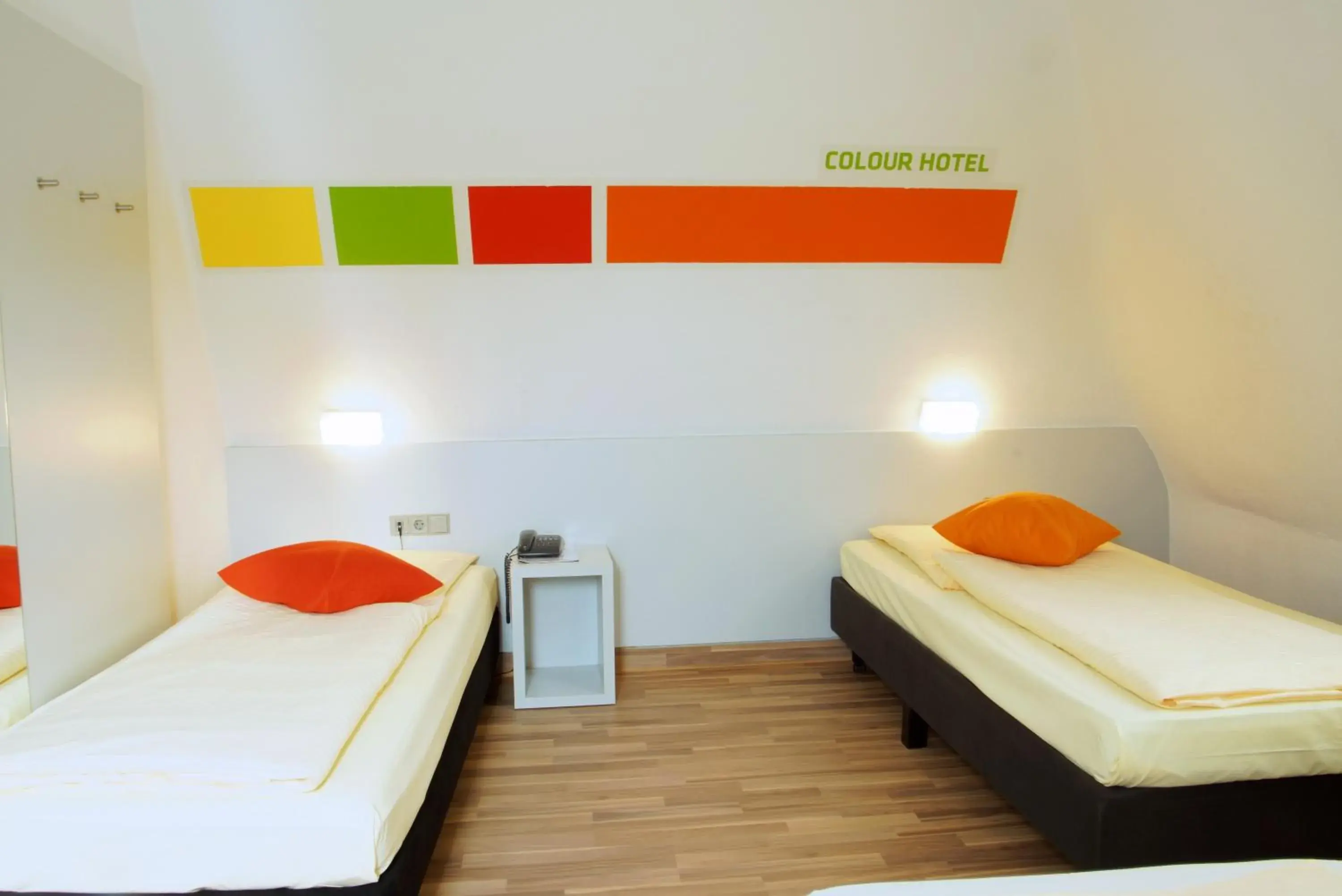 Photo of the whole room, Bed in Colour Hotel