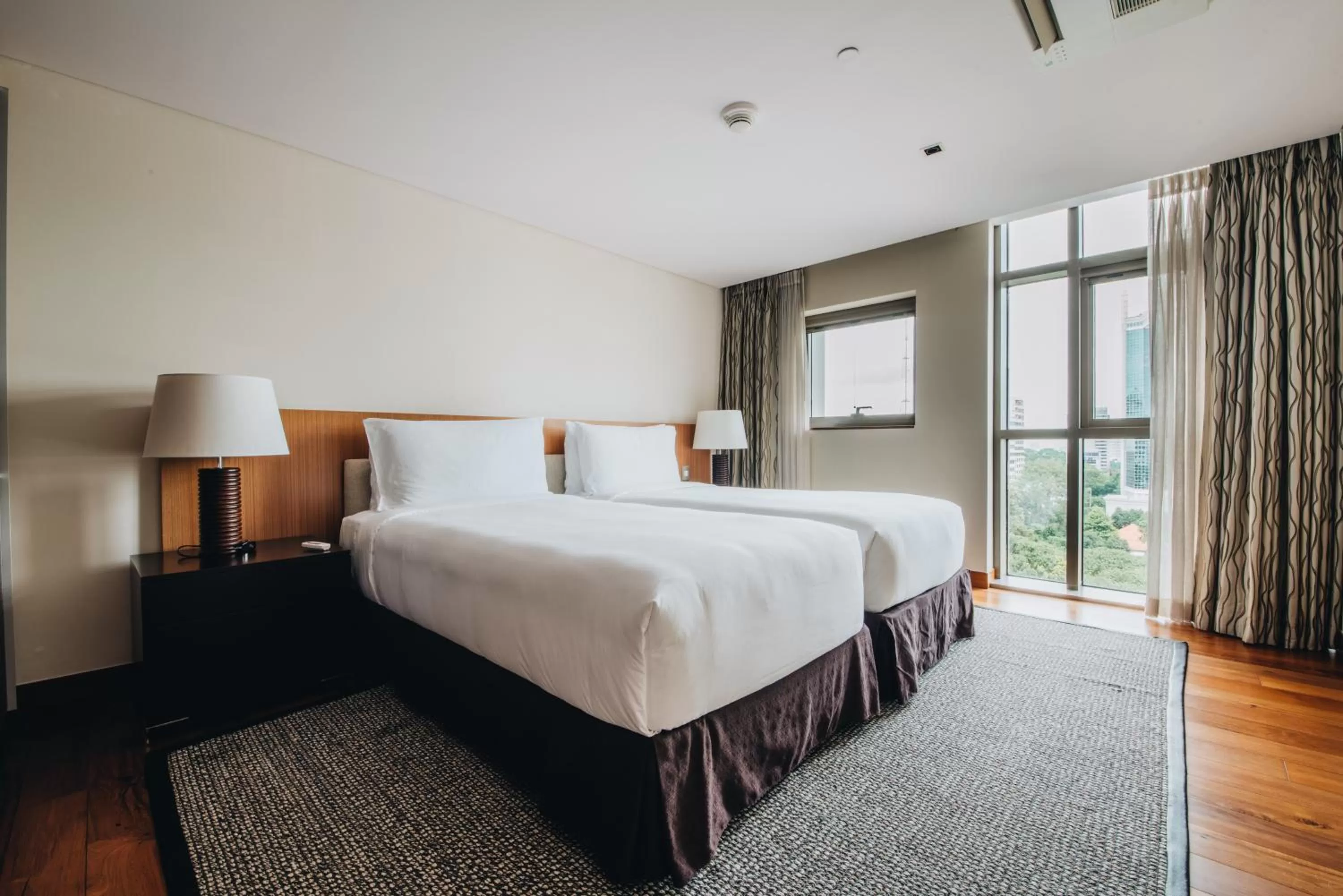 Bed in InterContinental Residences Saigon, an IHG Hotel