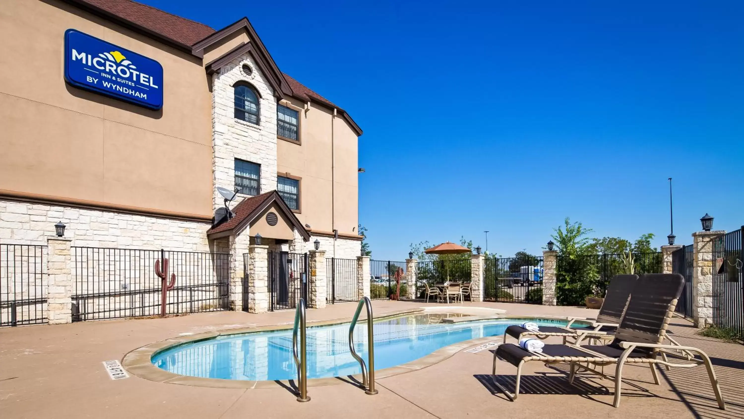 Swimming Pool in Microtel Inn & Suites by Wyndham Buda Austin South