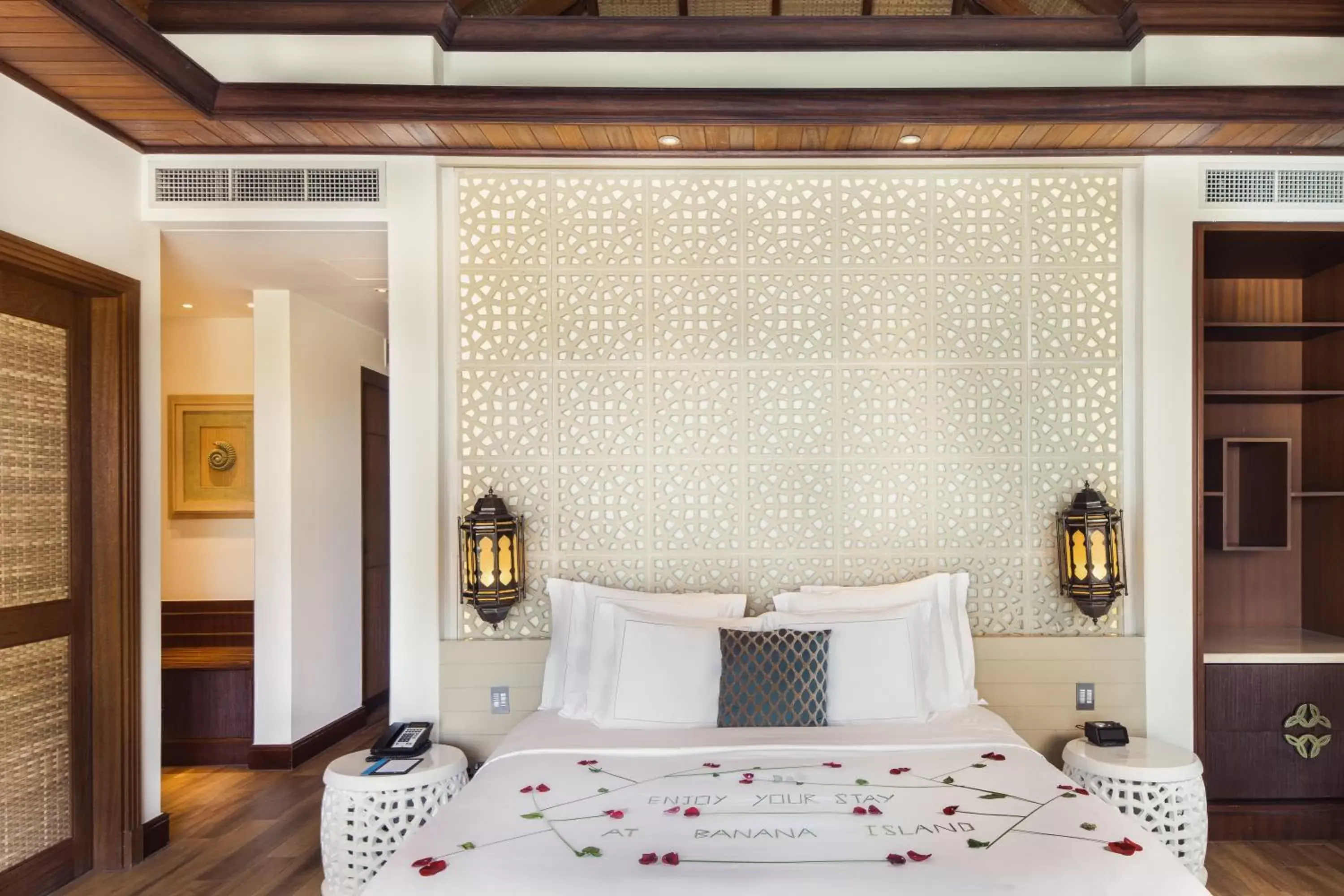 Bed in Banana Island Resort Doha by Anantara