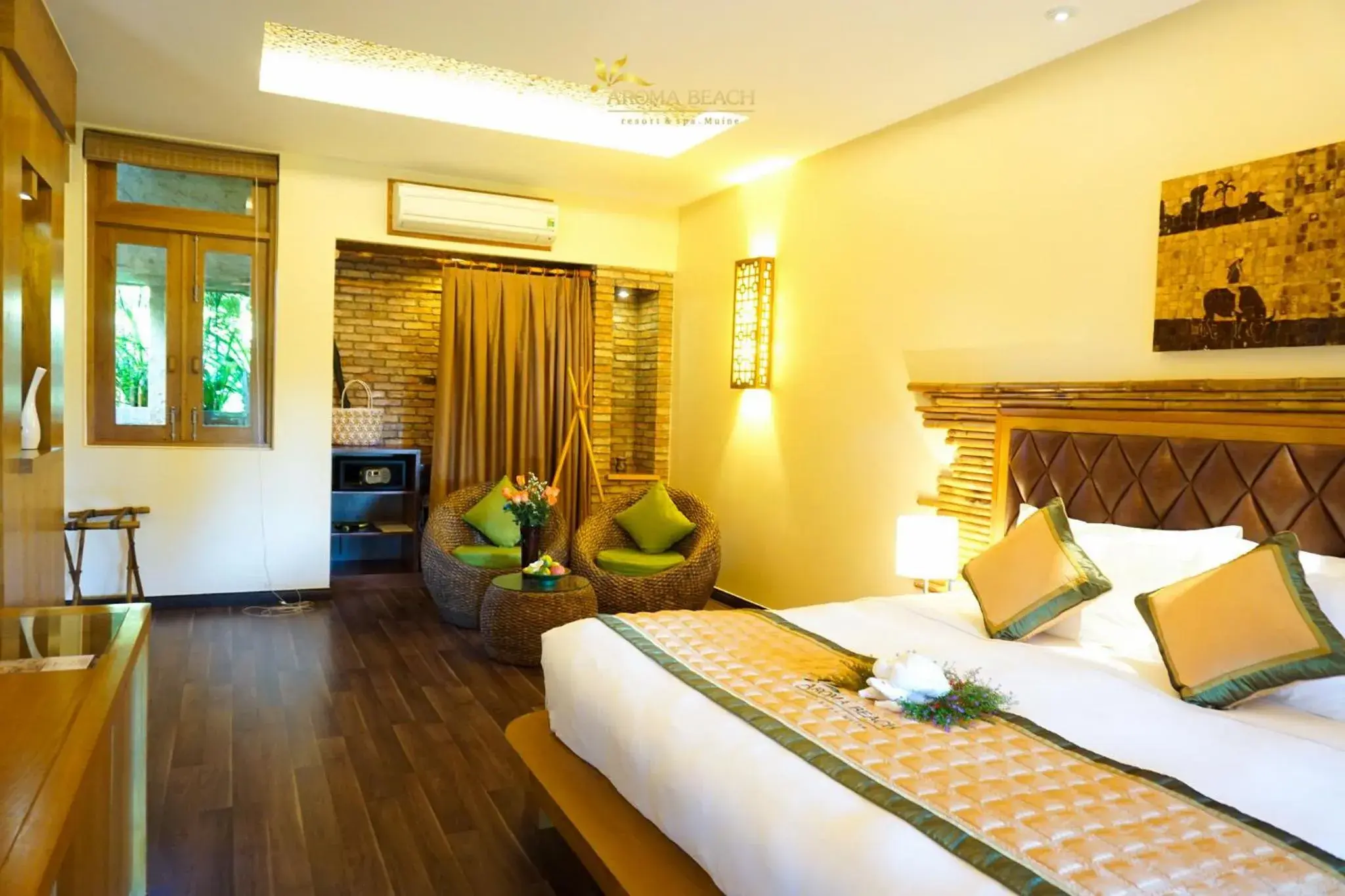 Bed in Aroma Beach Resort and Spa