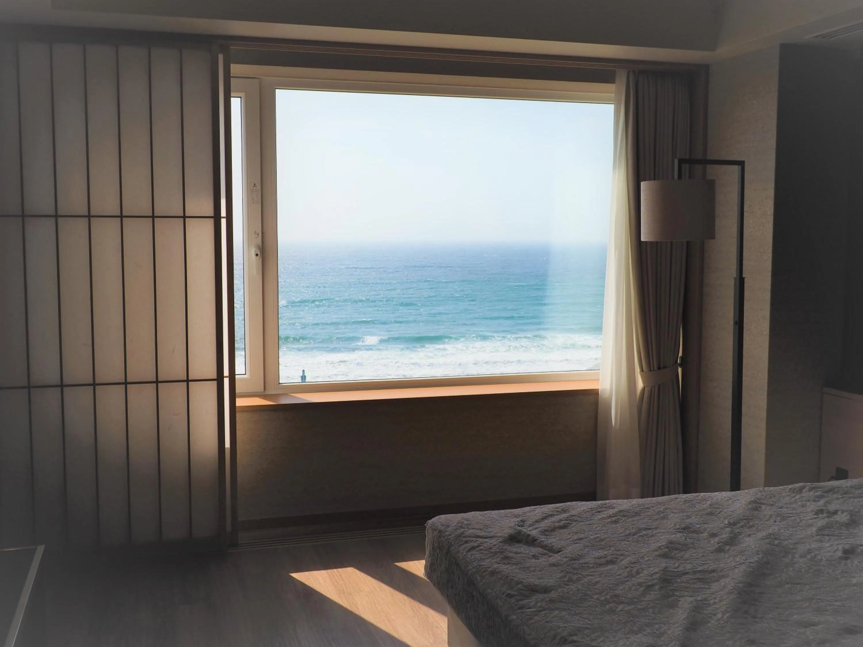 View (from property/room), Bed in Hakodate Yunokawa Onsen Umi to Akari Hewitt Resort