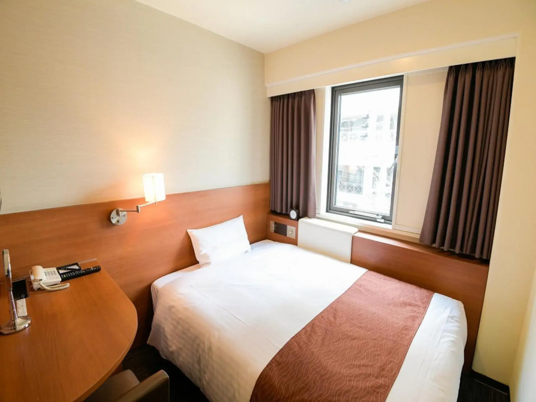 Bed in VIA INN SHIN OSAKA WEST - JR WEST GROUP