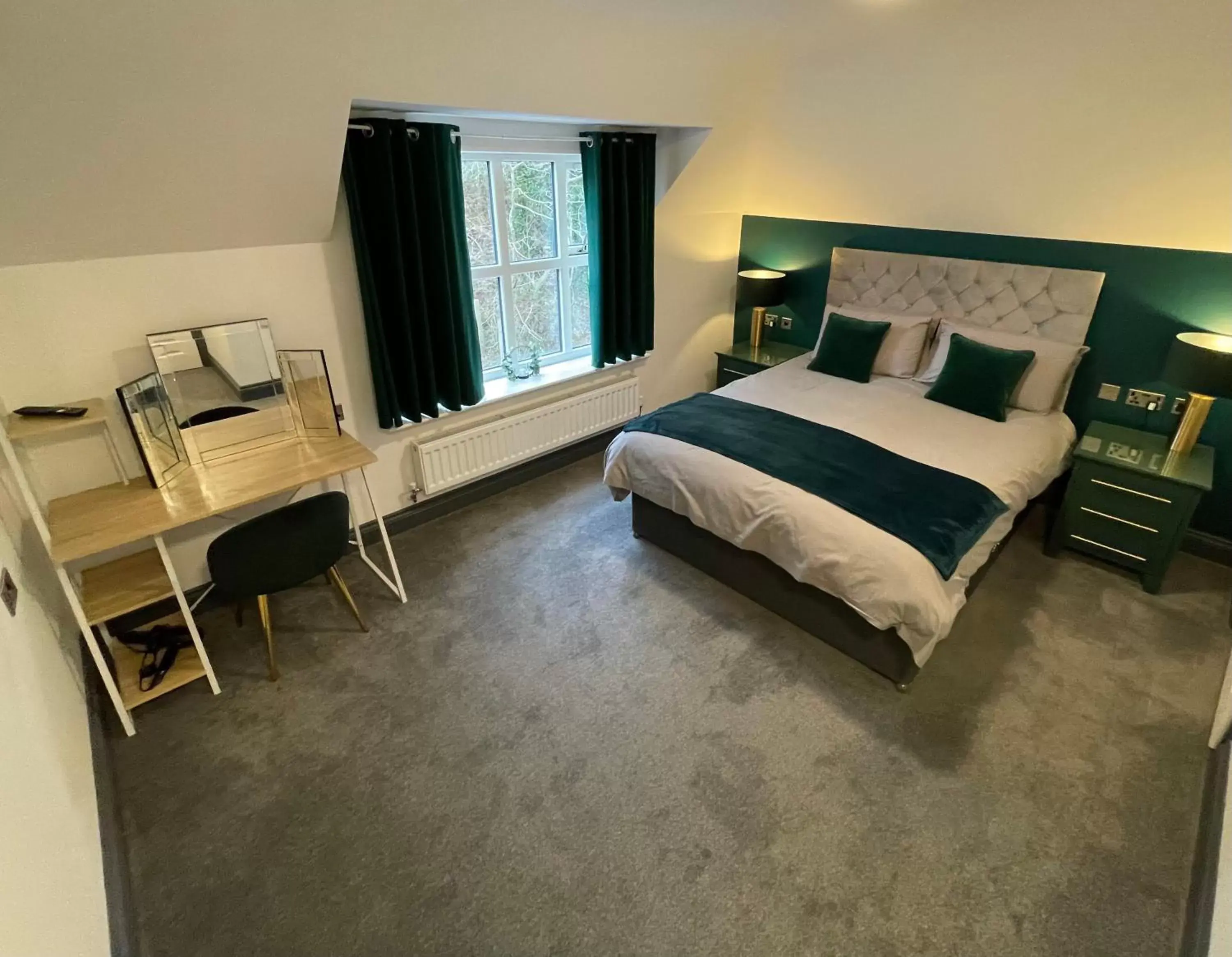 Bedroom in Cadmore Lodge Bed & Breakfast