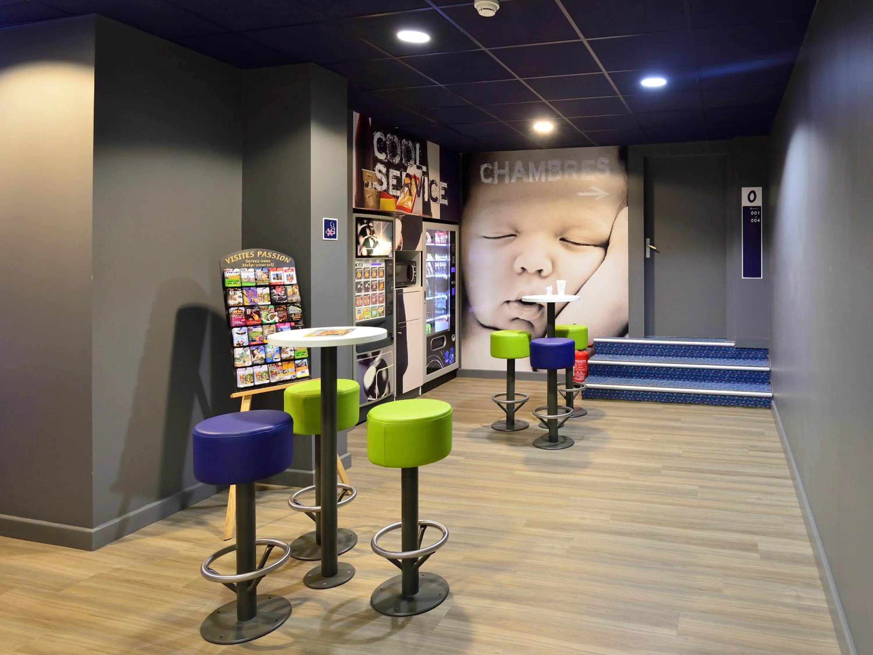 Communal lounge/ TV room in ibis budget Pau Lescar