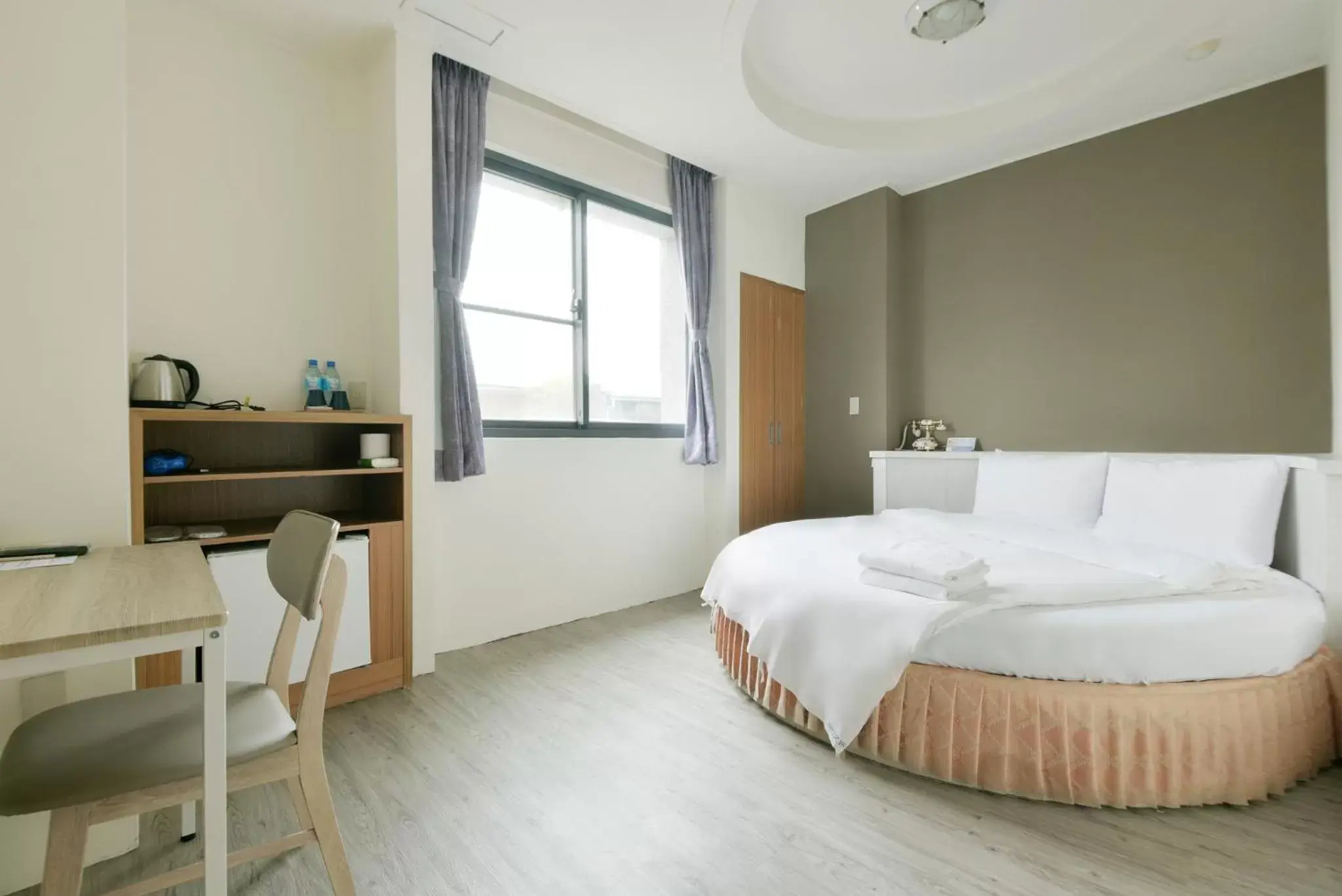 Bed in Raise Hotel Taichung