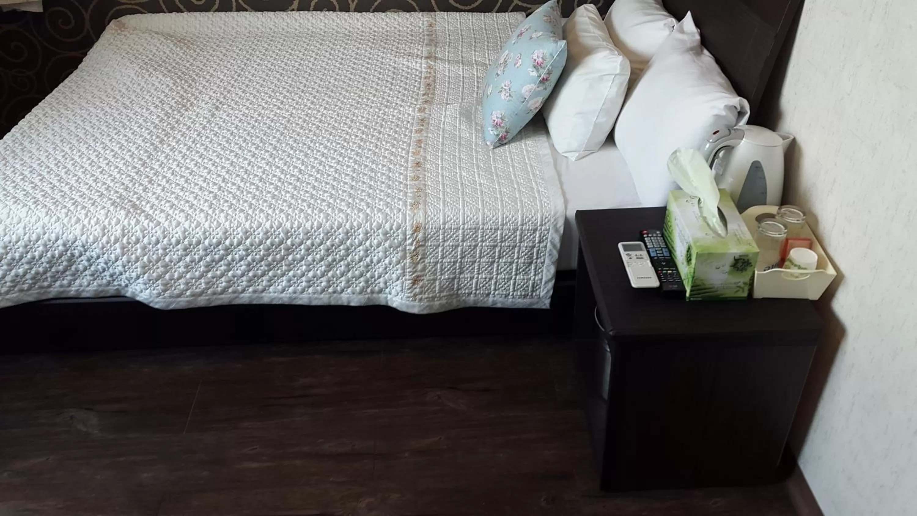 Bed in Saipan Motel with Sea View