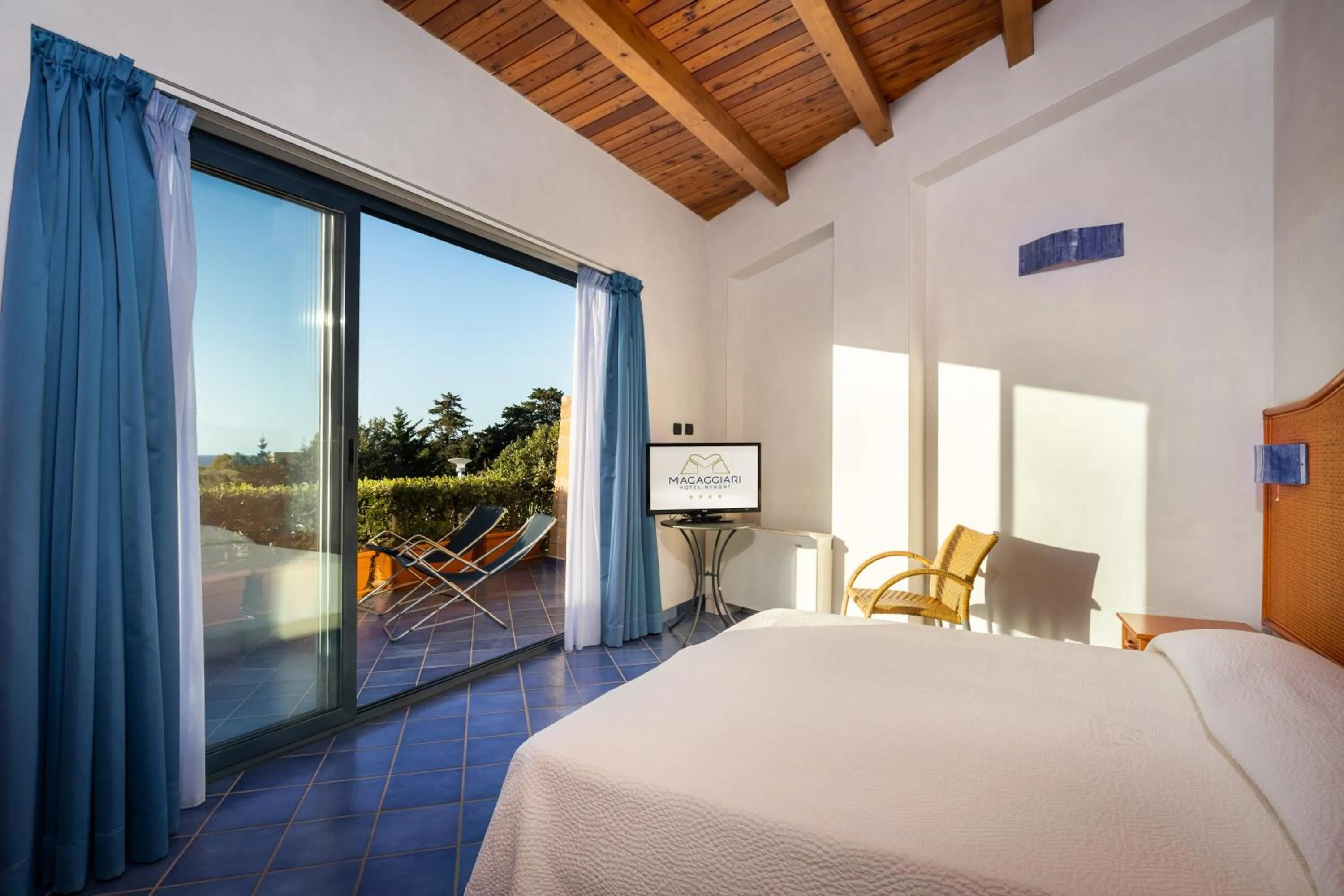 Bed in Magaggiari Hotel Resort