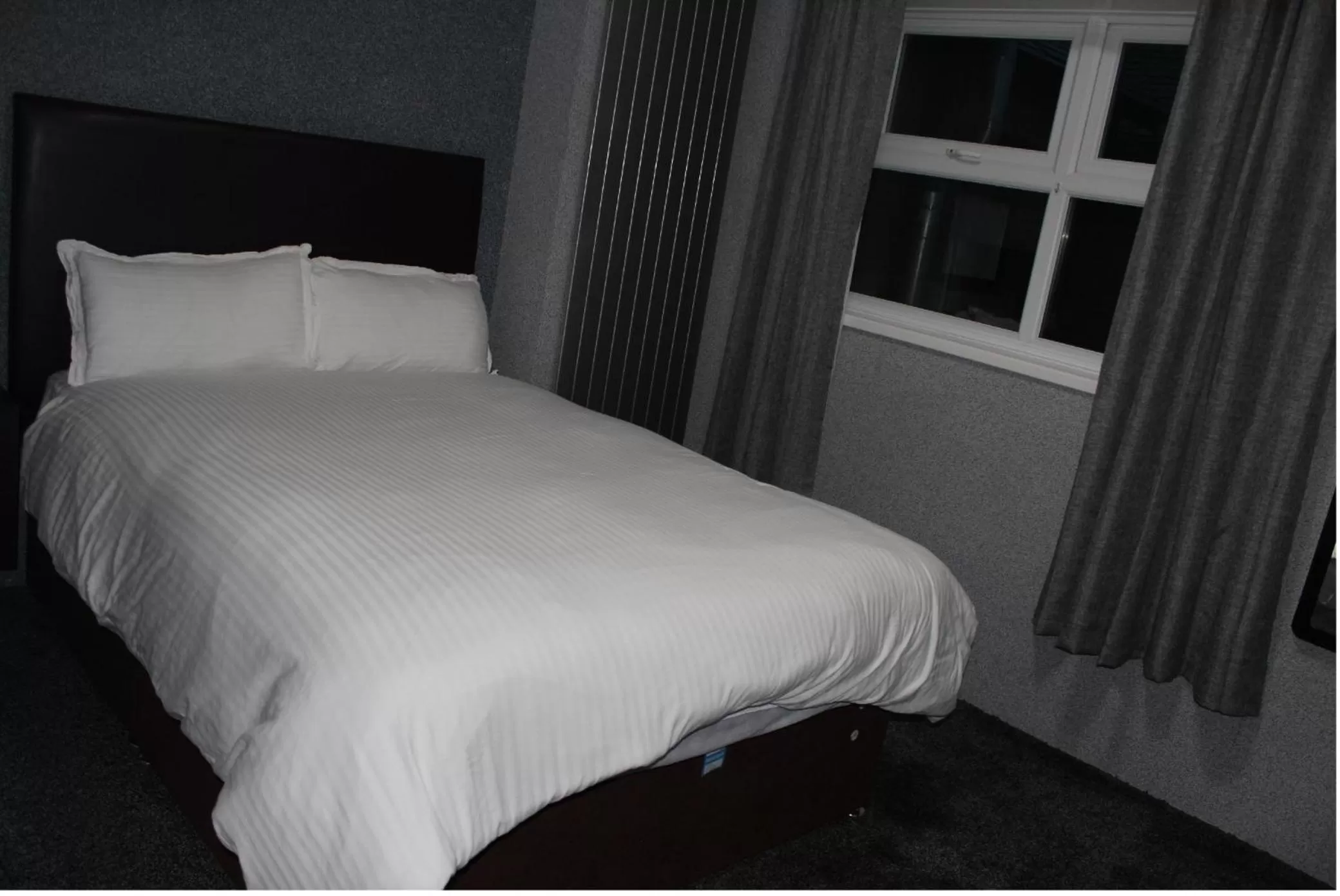 Bed in The Premier Lodge