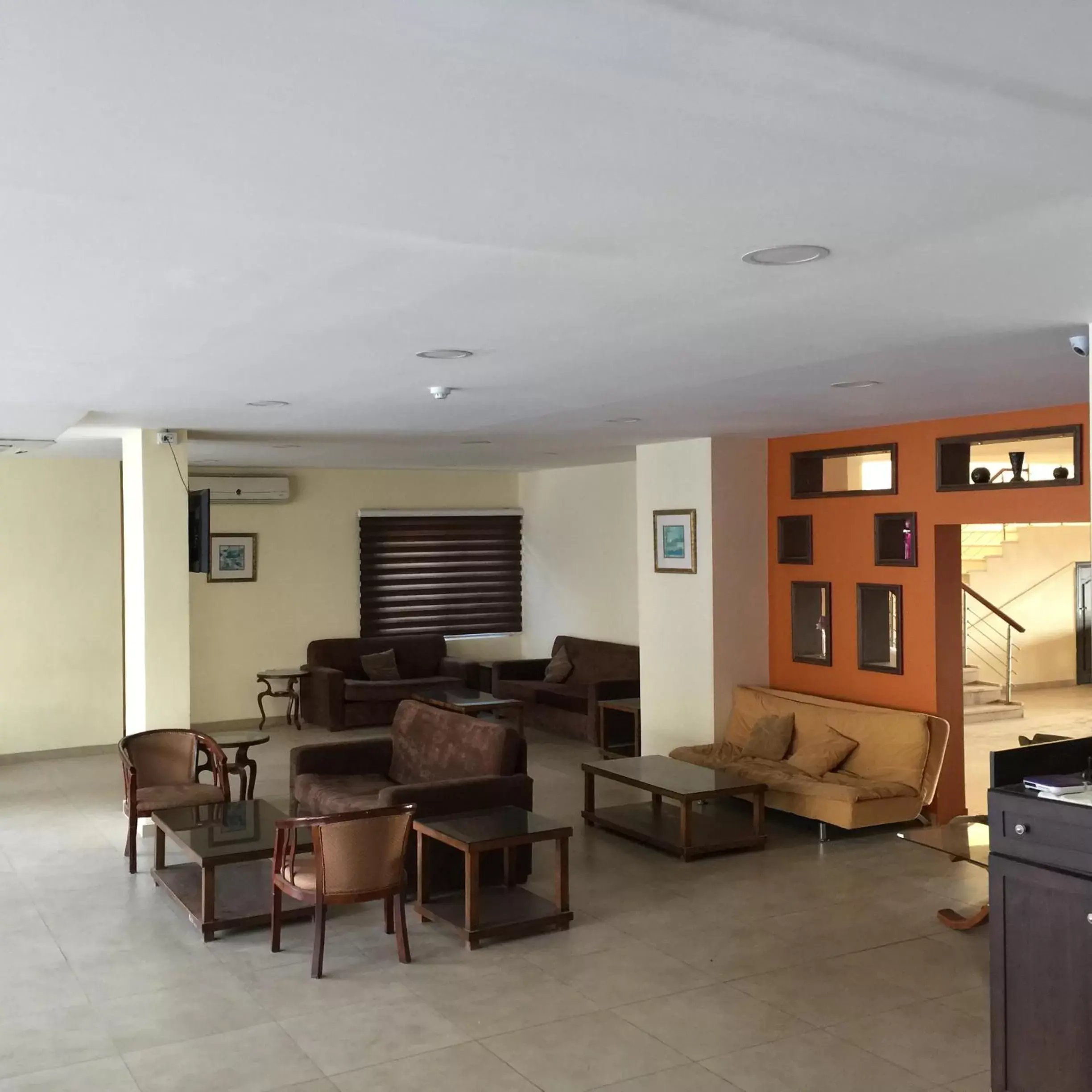Communal lounge/ TV room, Lobby/Reception in Zaina Plaza Hotel