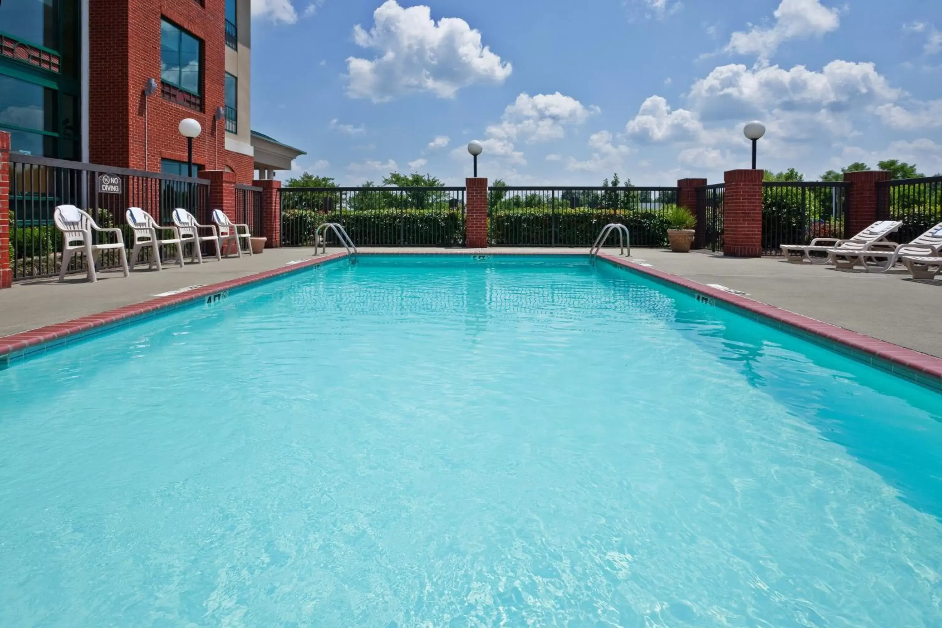 Swimming Pool in Holiday Inn Express Hotel & Suites Olive Branch, an IHG Hotel