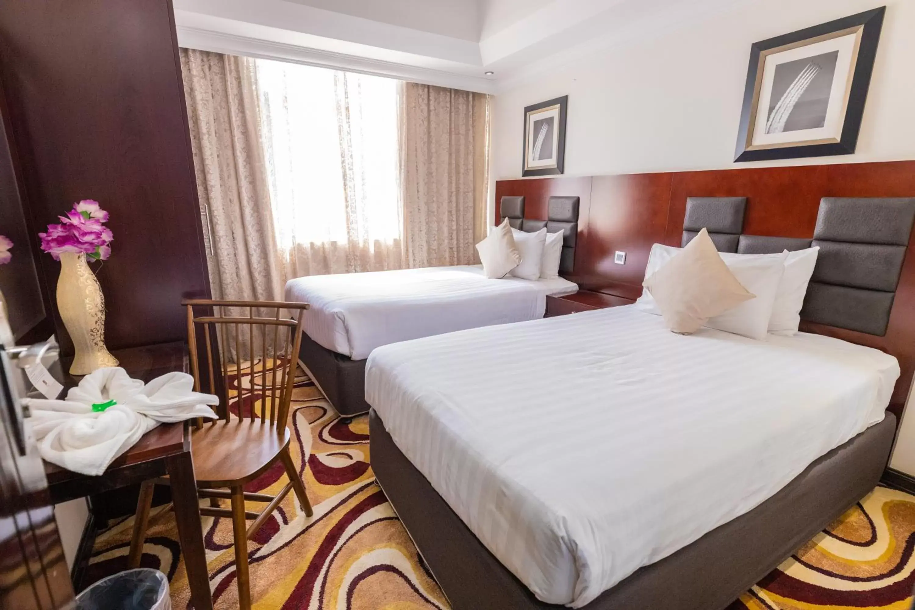 Bedroom, Bed in Ewan Ajman Suites Hotel