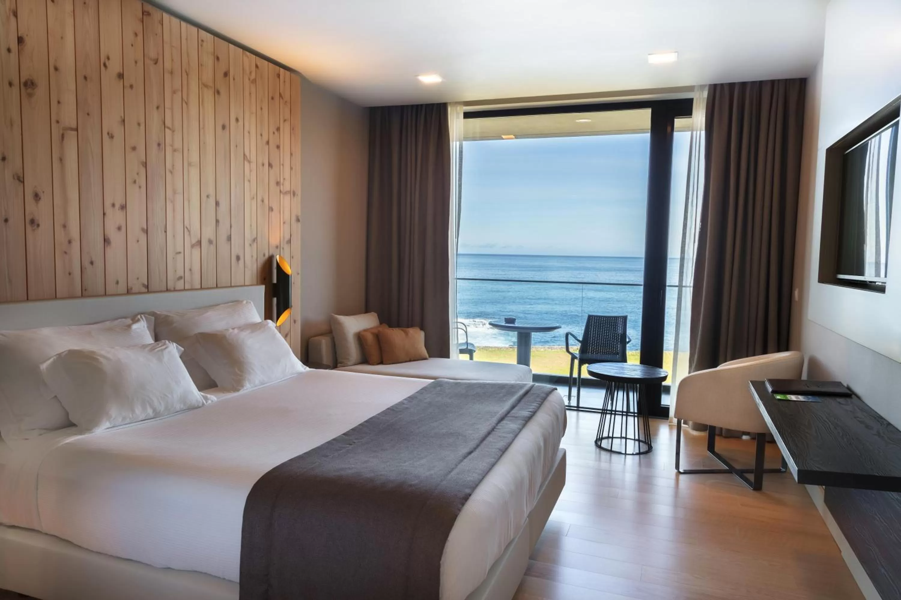 Bedroom, Bed in Pedras do Mar Resort & Spa